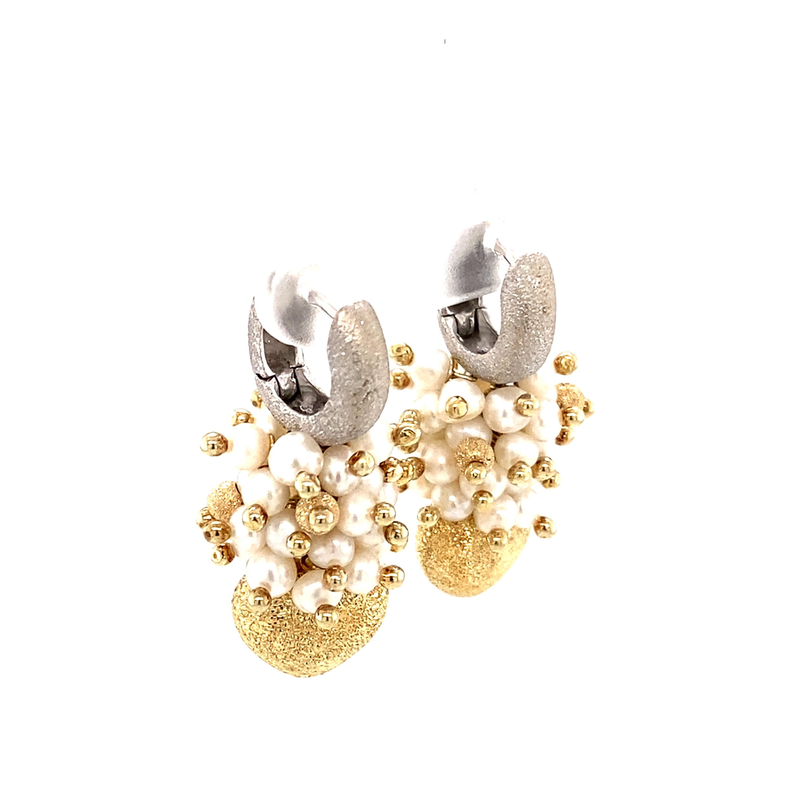 Beautiful Retro earrings featuring Seed Pearl Clusters and 14 karat two tone gold 
Hallmarked 14K 