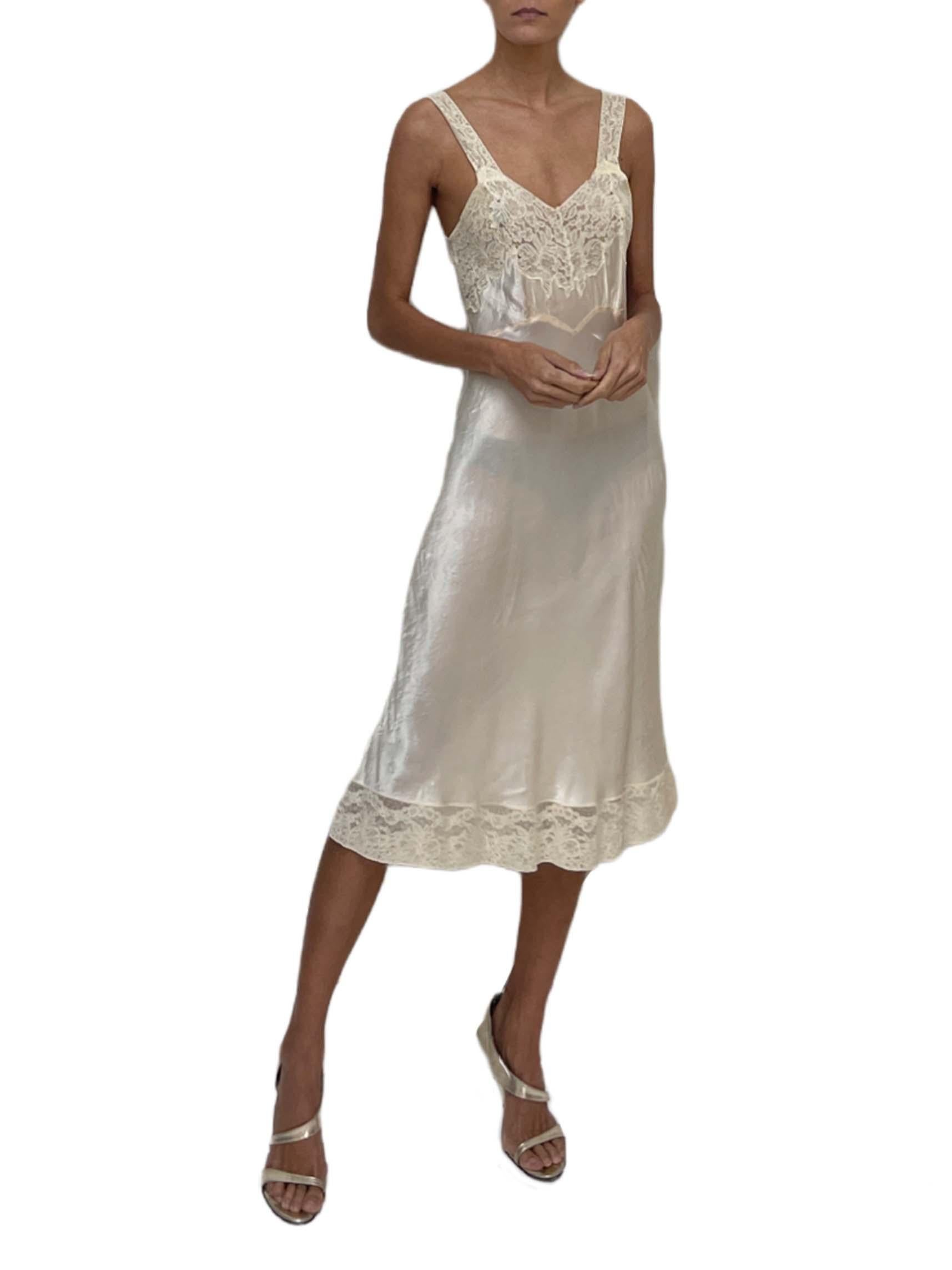 1940S Ivory Bias Cut Rayon Satin Slip With Lace Trim In Excellent Condition For Sale In New York, NY