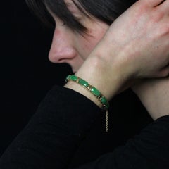 1940s Jade 14 Karat Yellow Gold Bangle Bracelet