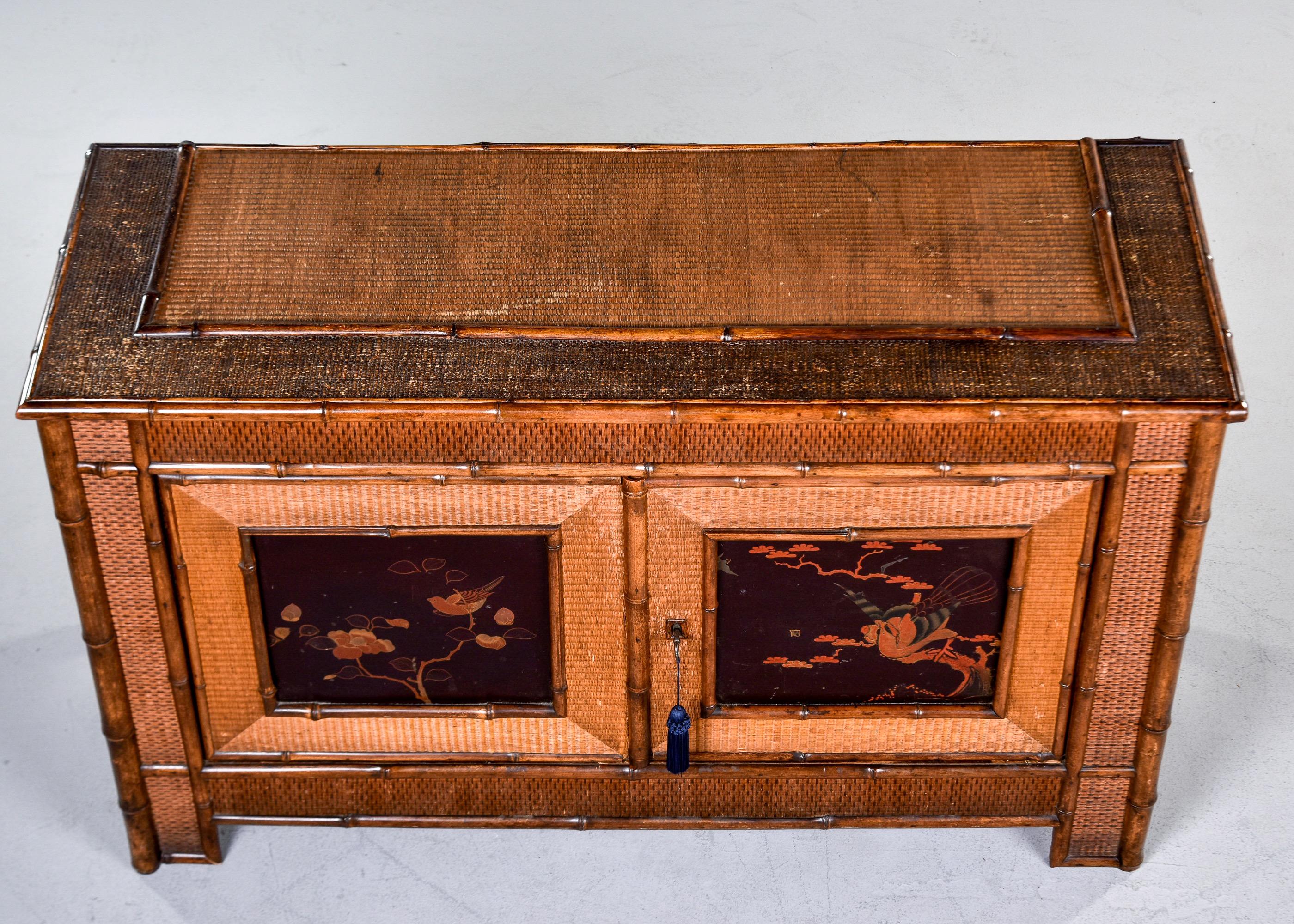 English 1940s Japanese Style Bamboo Cabinet with Painted Panels For Sale