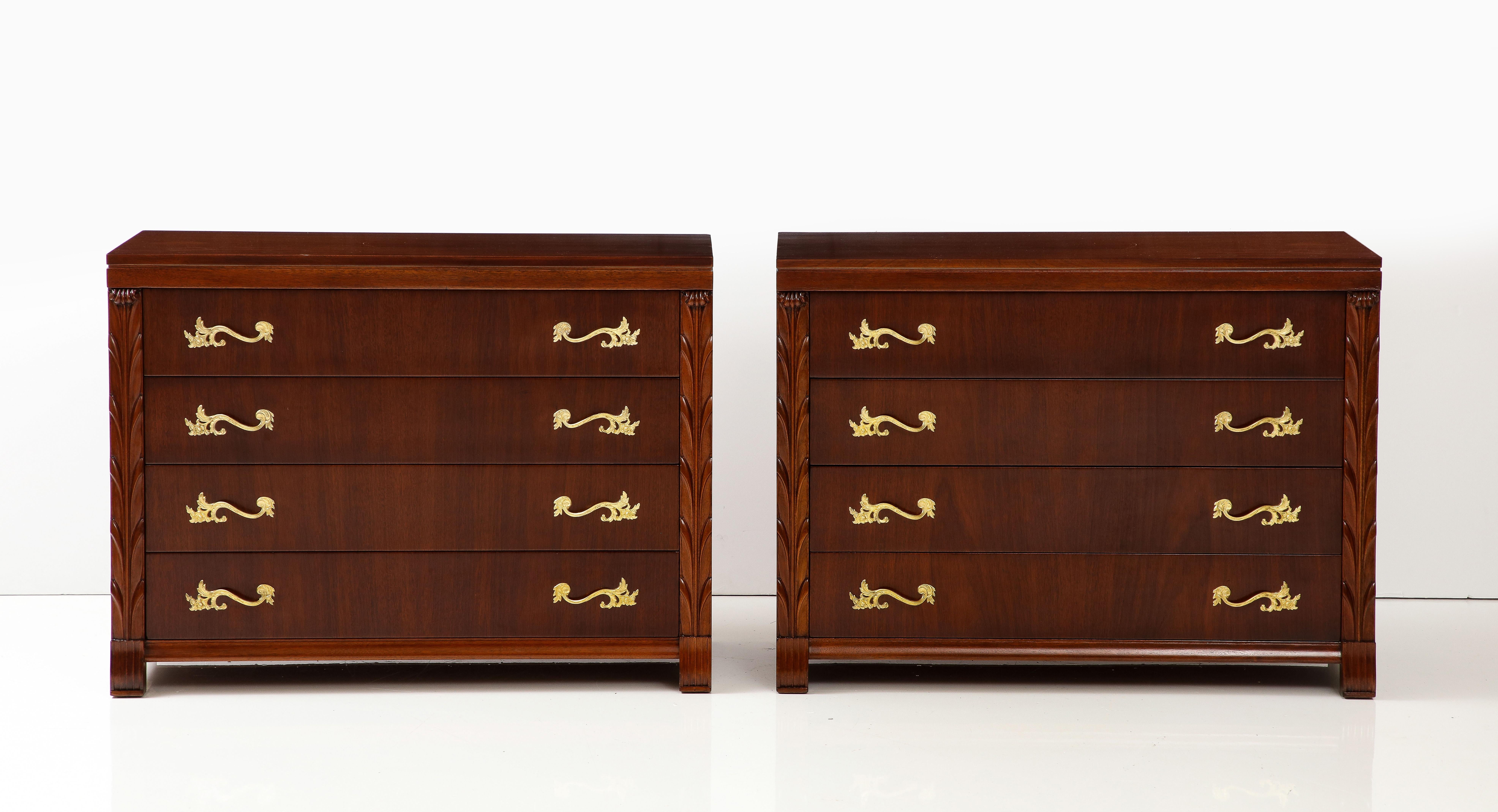 Amazing pair of large 1940s John Stuart Inc. 4 Drawer mahogany commodes with gilt brass handles, fully restored with minor wear and patina due to age and use.