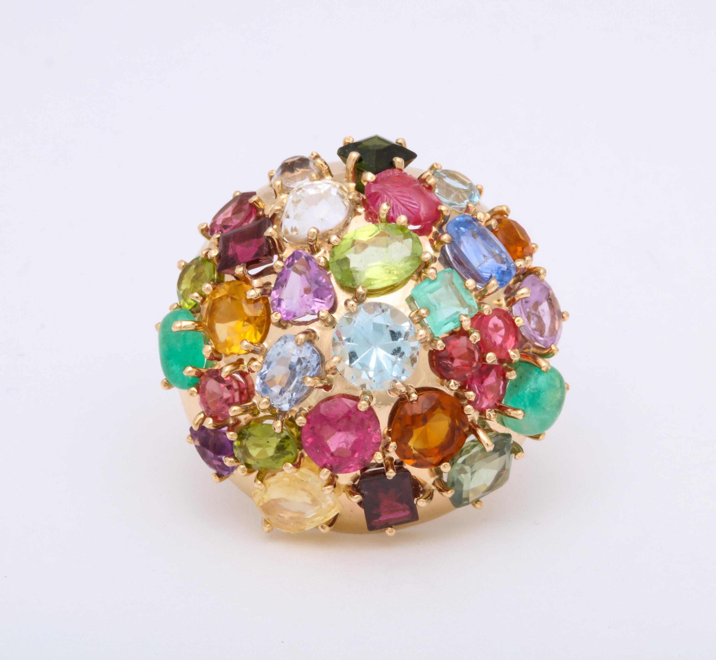One 14kt High Polish Yellow Gold Ring Size 5.75 NOTE: MAY BE RESIZED. Embellished With Numerous Multi Colored Stones Composed Of Carved Rubies, Ceylon Sapphires,Citrines,Emeralds,Peridots,Yellow Sapphires,Amethyst,And Aquamarines. Dramatic Cocktail
