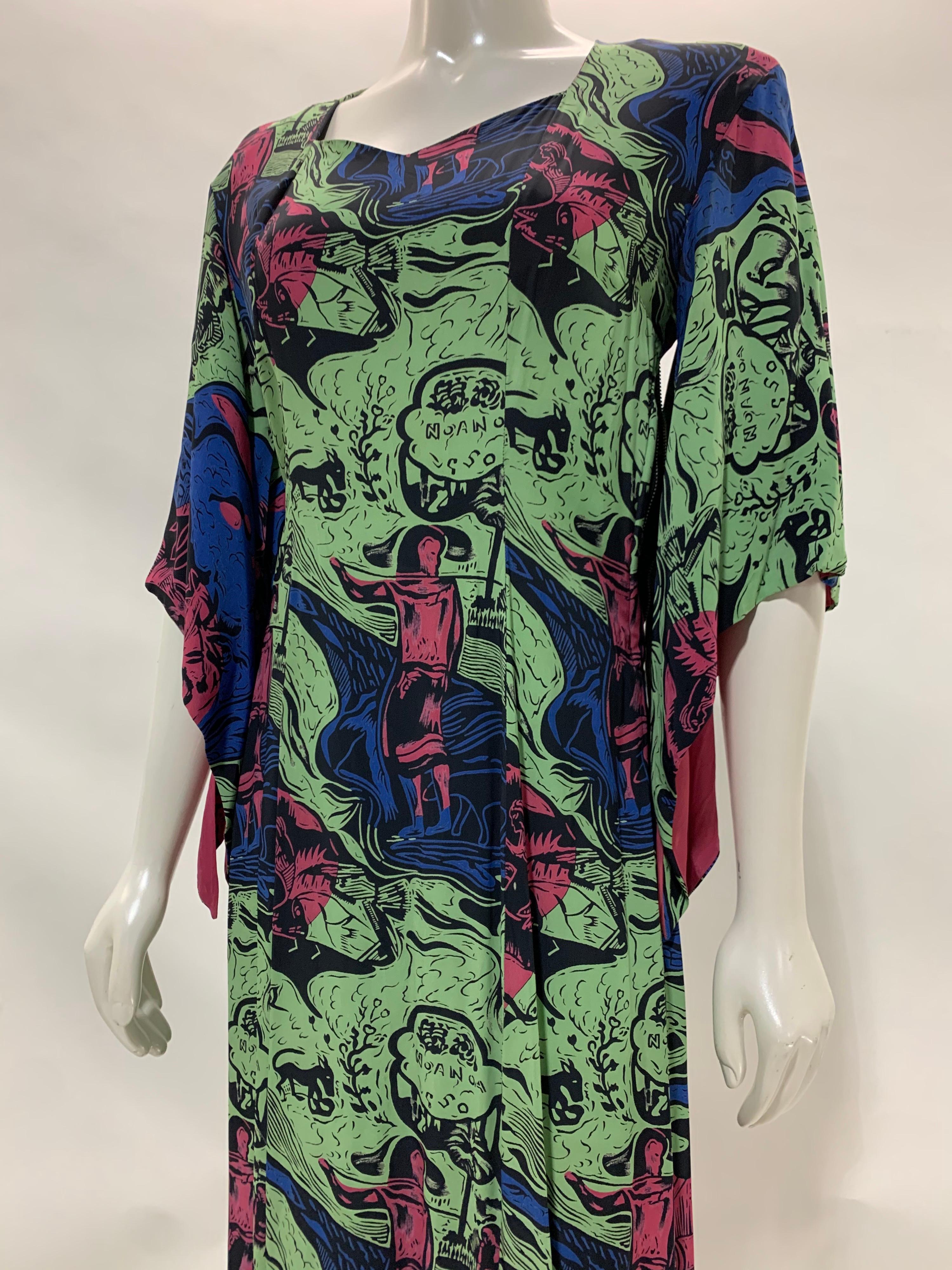 A fabulous and rare 1940s Kamehameha Polynesian styled mid-century graphic figural print rayon dress or caftan in chartreuse, magenta, black and cobalt blue. Solid magenta lining on traditional bell-shaped sleeves. Size 4-6.