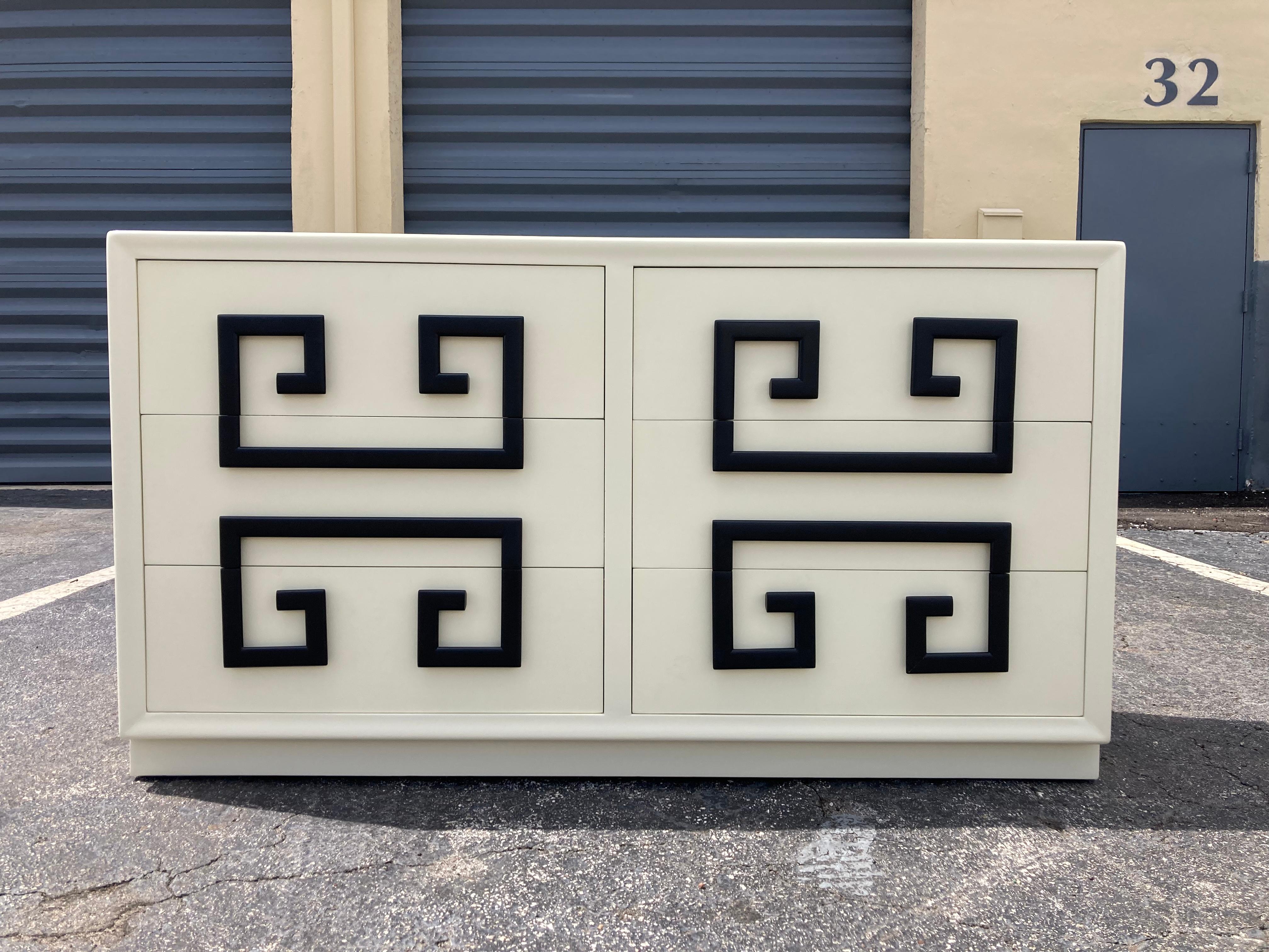 Kittinger Mandarin Greek Key Six Drawer Dresser, cream color lacquer and black pulls. Ready for a new home. Dresser is not signed. Matching Nightstand available.