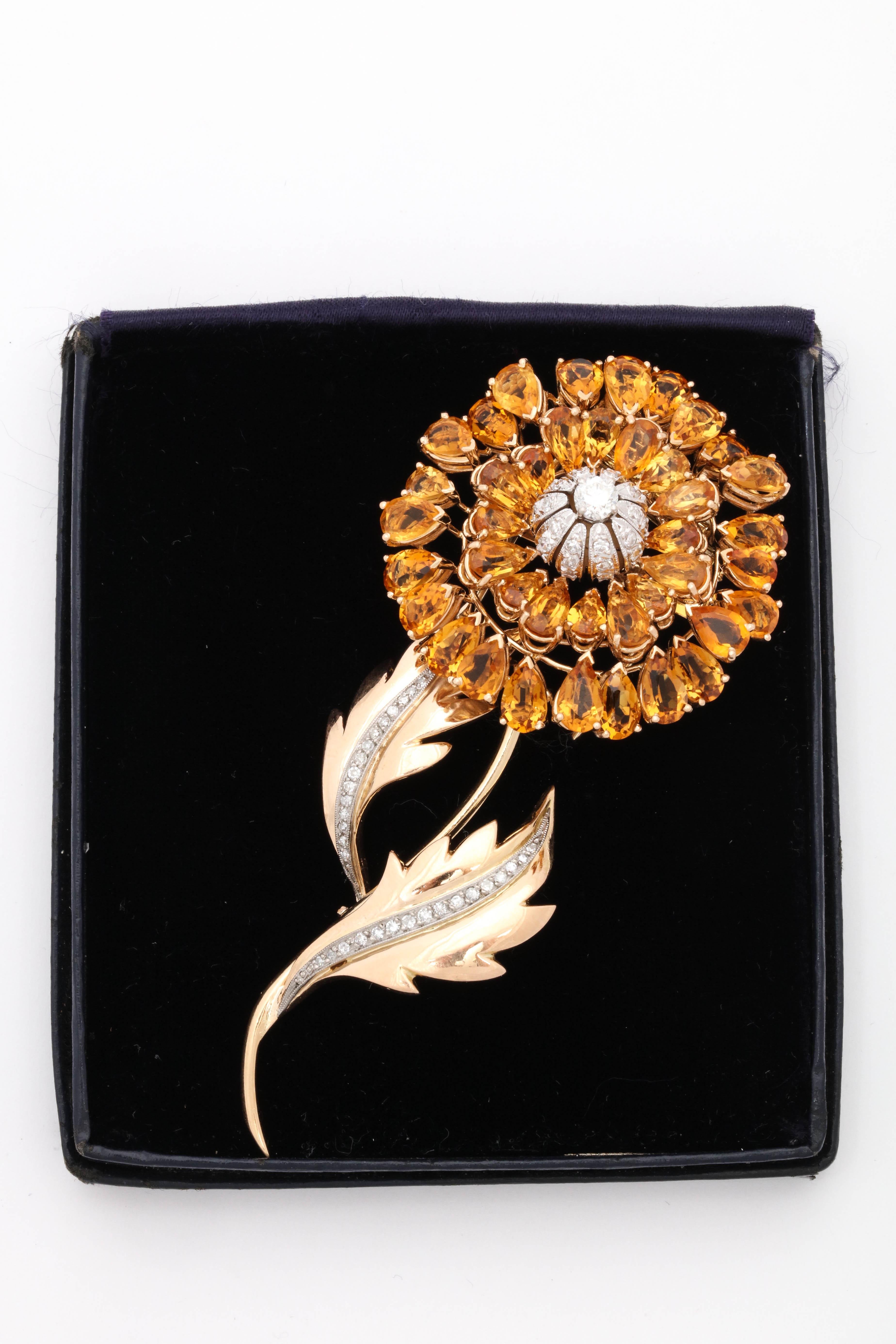 One 18kt Yellow Gold Figural Flower Brooch Embellished With Numerous Pear Shaped Beautiful Color Citrines Weighing Approximately 40 Carats. Further Designed With Numerous Full Cut Diamonds Weighing Approximately 2 Carats Total Weight. Approximate