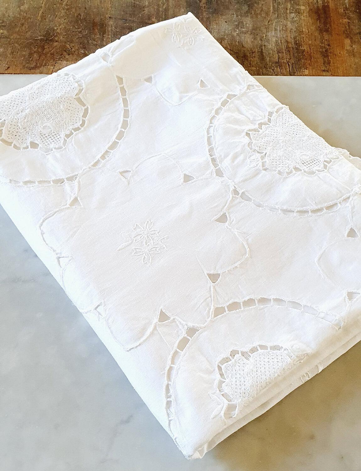 A wonderful hand-embroidered large white Italian linen tablecloth found in a market in Umbria. I am very particular when it comes to vintage tablecloths favouring only some designs. This is wonderful - 1940s but perfect for a modern countryside