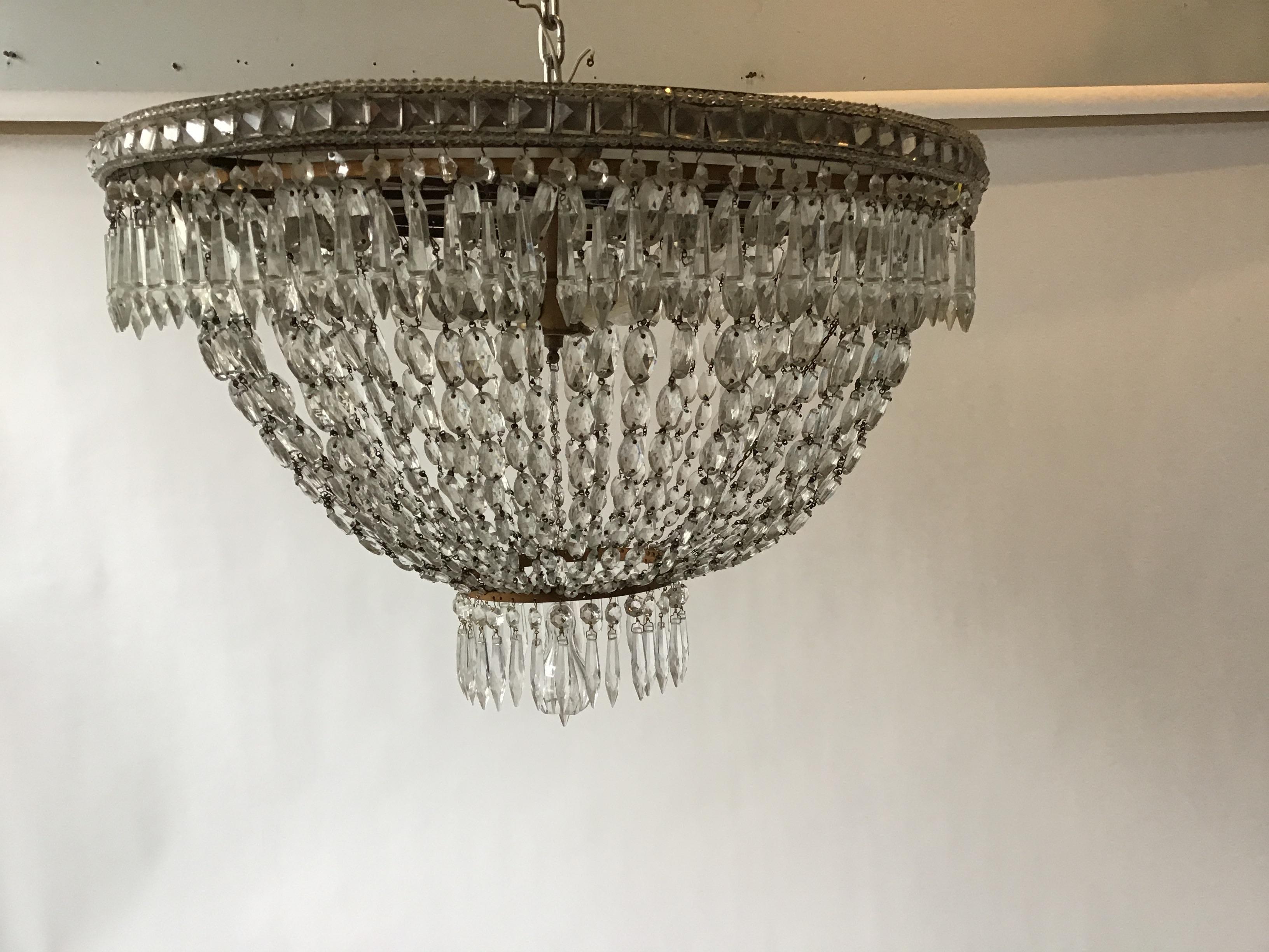 1940s oval French flush mounted chandelier, from a Southampton estate.