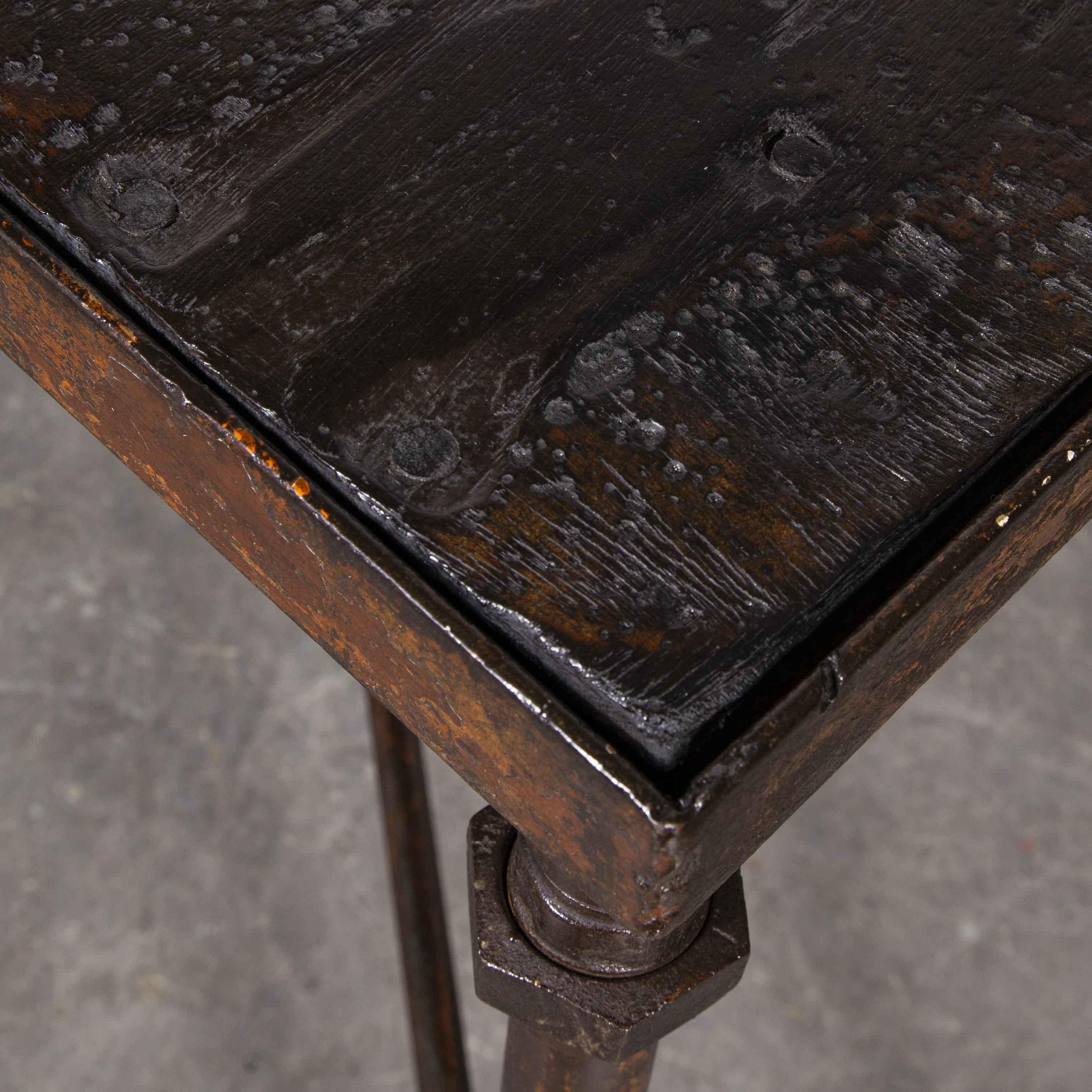 1940’s Large square Industrial console table

1940’s Large square Industrial console table. Sourced from a tannery in Belgium this large table stood pride of place in the sales atelier. The frame is welded solid with interesting detail and a rich