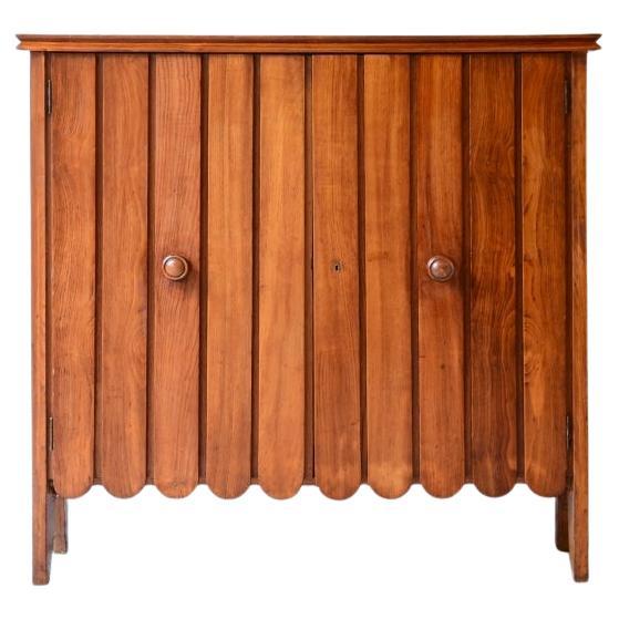1940
s Light oak storage unit with slatted doors For Sale