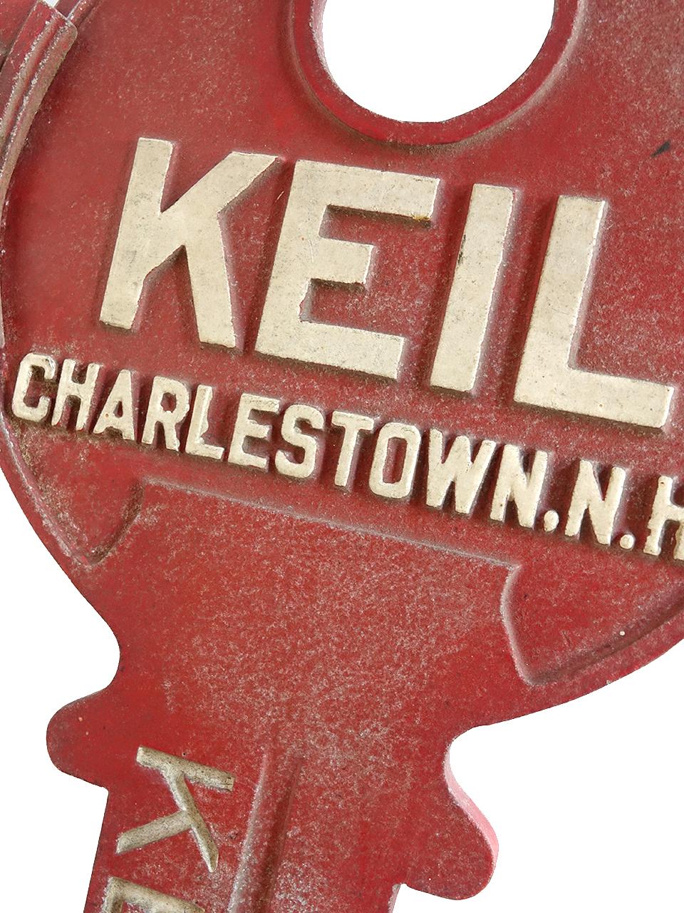 This is nicely done midcentury key trade sign. Its thick cast aluminum and 2 sided with most of the original paint. The key can move to any angle on the wall bracket. The key can also remove from the bracket for hanging.