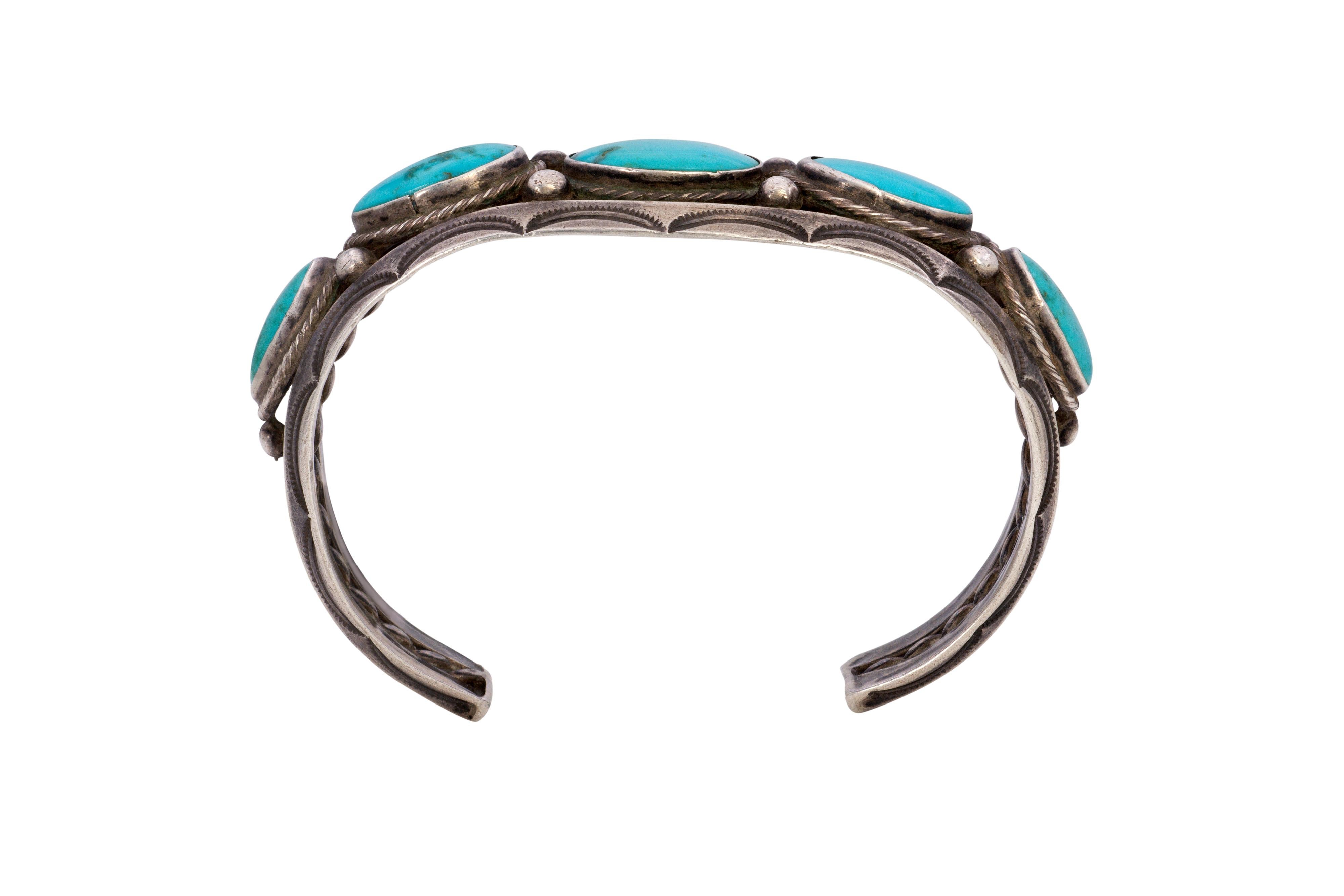 A unisex Lone Mountain cabochon turquoise and silver cuff, made by a Navajo artist, 1940s. Inner circumference measures 5.25
