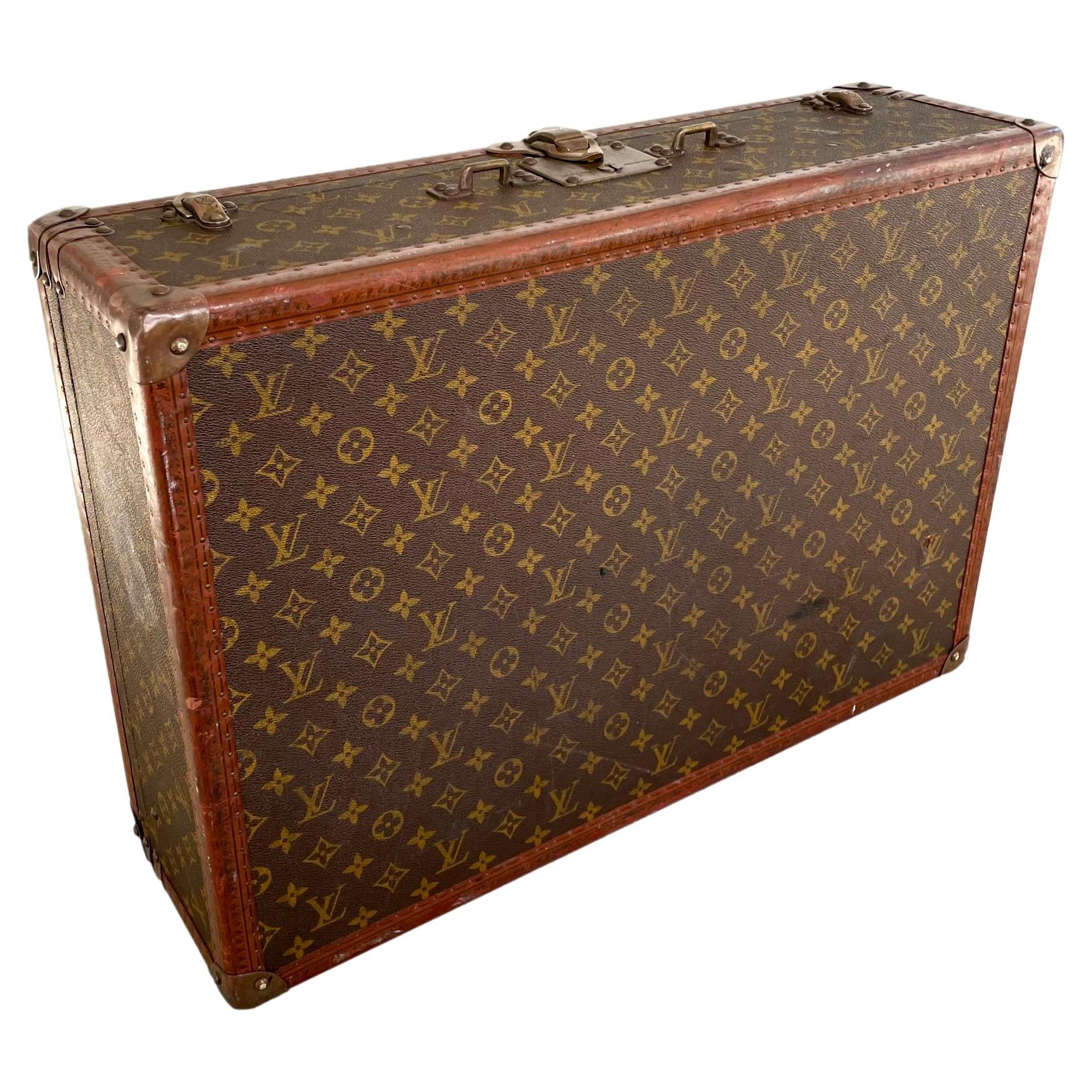 Sold at Auction: A Louis Vuitton lady's hat box or square steamer trunk,  circa 1940s