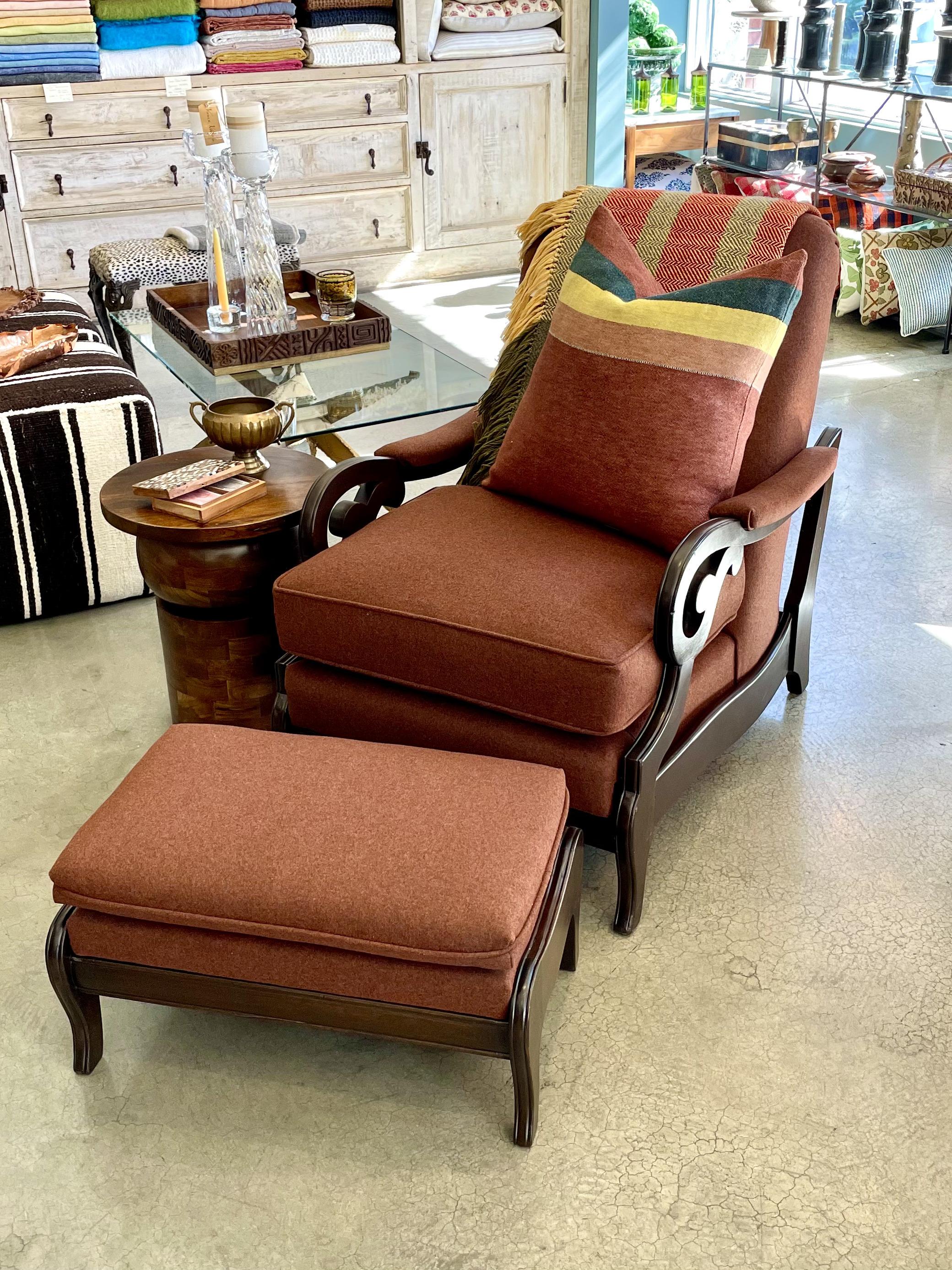 Handsome, inviting and ready for some serious R & R!

Fantastic 1940's Lounge Chair has matching footstool. The sturdy wood frame has been refinished and newly upholstered in a rich terra cotta felt wool from Italy. The seat cushion has been down