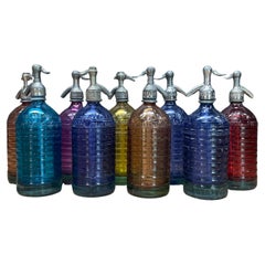 Collection de bouteilles de soda Lourdes Siphon Seltzer des années 1940, décor vintage coloré en verre