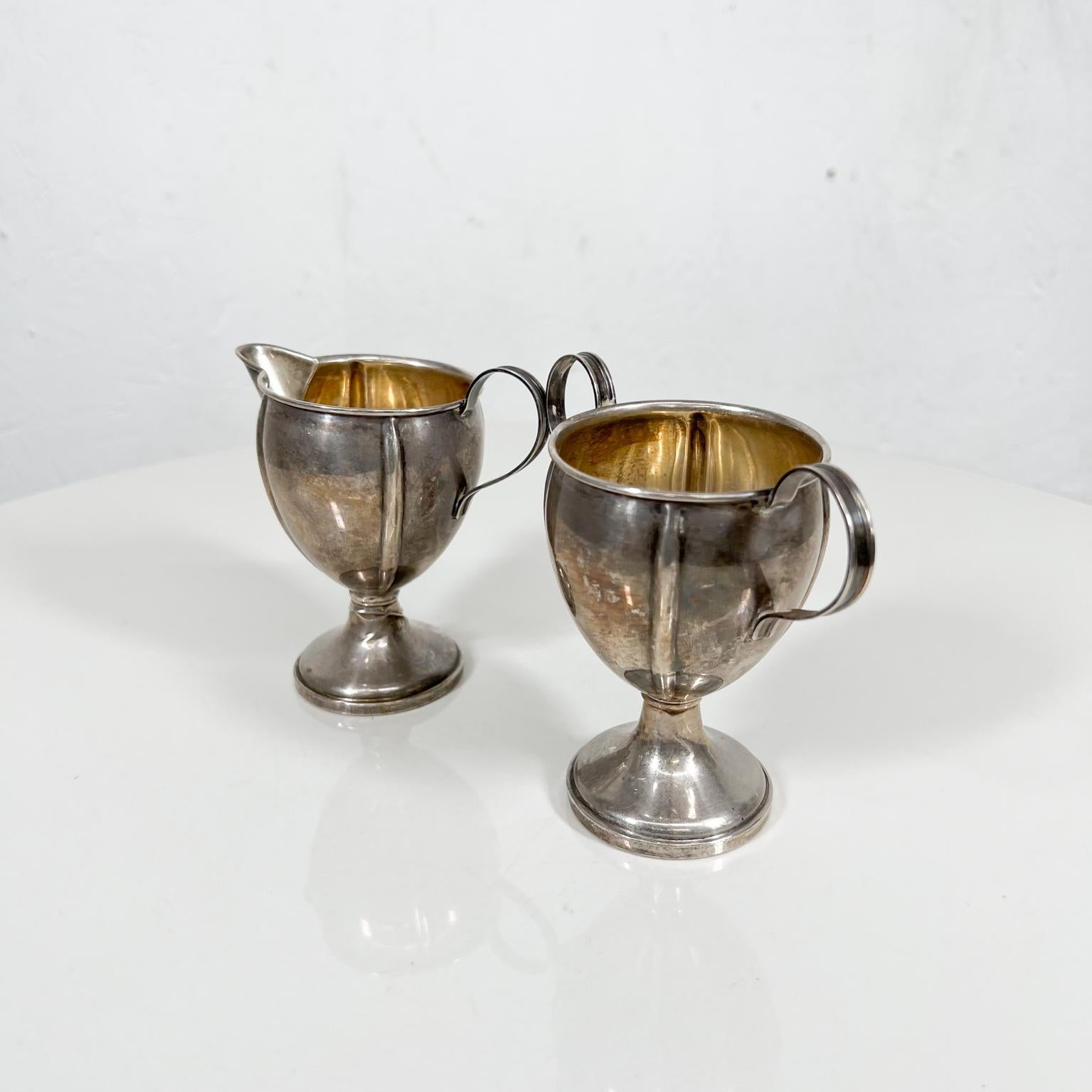 1940s Vintage M Fred Hirsch MFH elegant sterling silver sugar creamer set
See provided images
Stamped by maker
Measures: 4 tall x 2 diameter
Preowned original unrestored vintage condition.
 