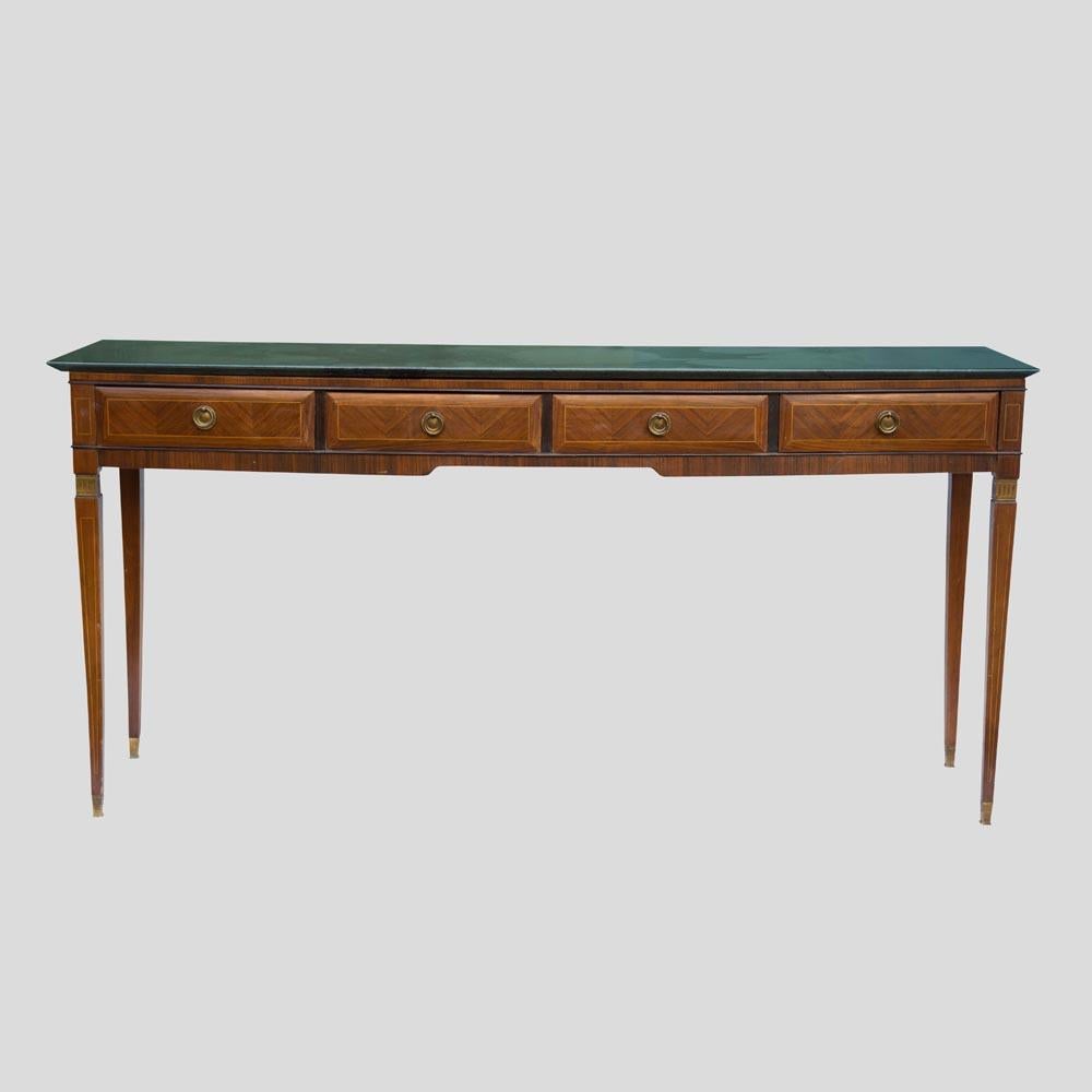 An elegant 1940's console table, beautiful wallnut marquetry four drawers with original brass handles, original green marble top, tapered legs and feet with brass decorations and brass feet.
Italian 1940s Design attributed to the architect Paolo