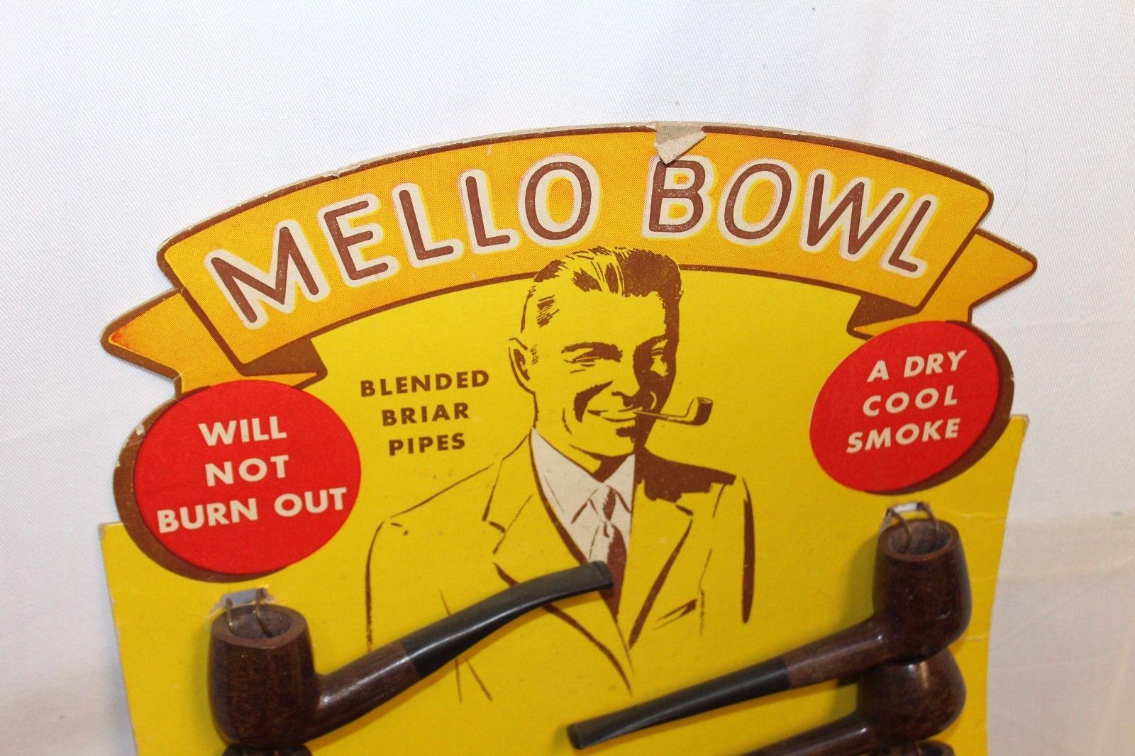 Tobacco advertising for Mello Bowl Pipes. Early 1940s advertising that has some original pipes still attached. This is one example of tobacco pipes advertising.