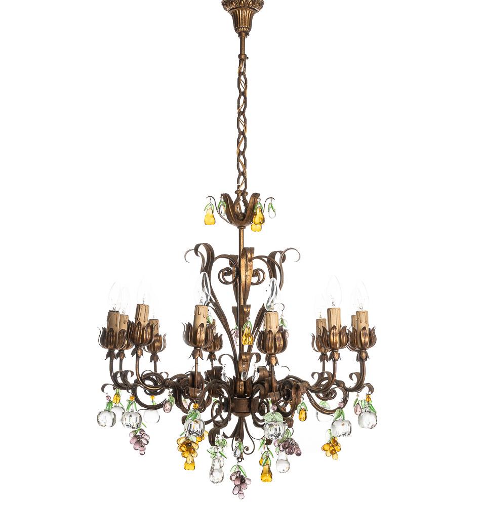 This is a stunningly decorative lamp from early 20th century. It has a rich, deep bronze colour while the highly crafted metalwork arms flow elegantly from the solid base. Well crafted glass fruit elements. Apples, grapes, pear in different colors.