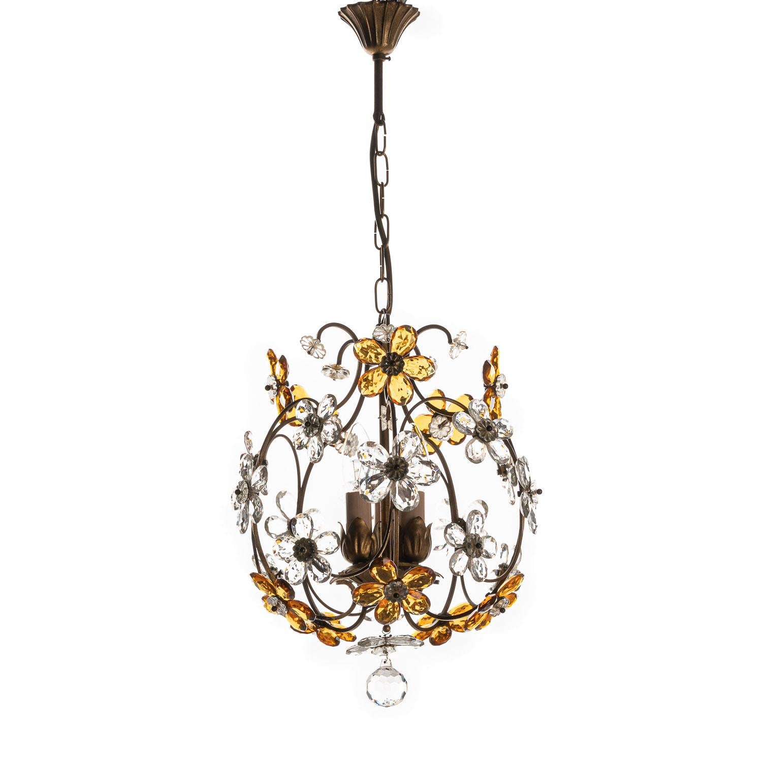 Charming gilt metal lantern with amber colored and clear crystal glass petals creating a flower. It holds three E14 sockets. We also have a similar fixture and one with blue colored petals.