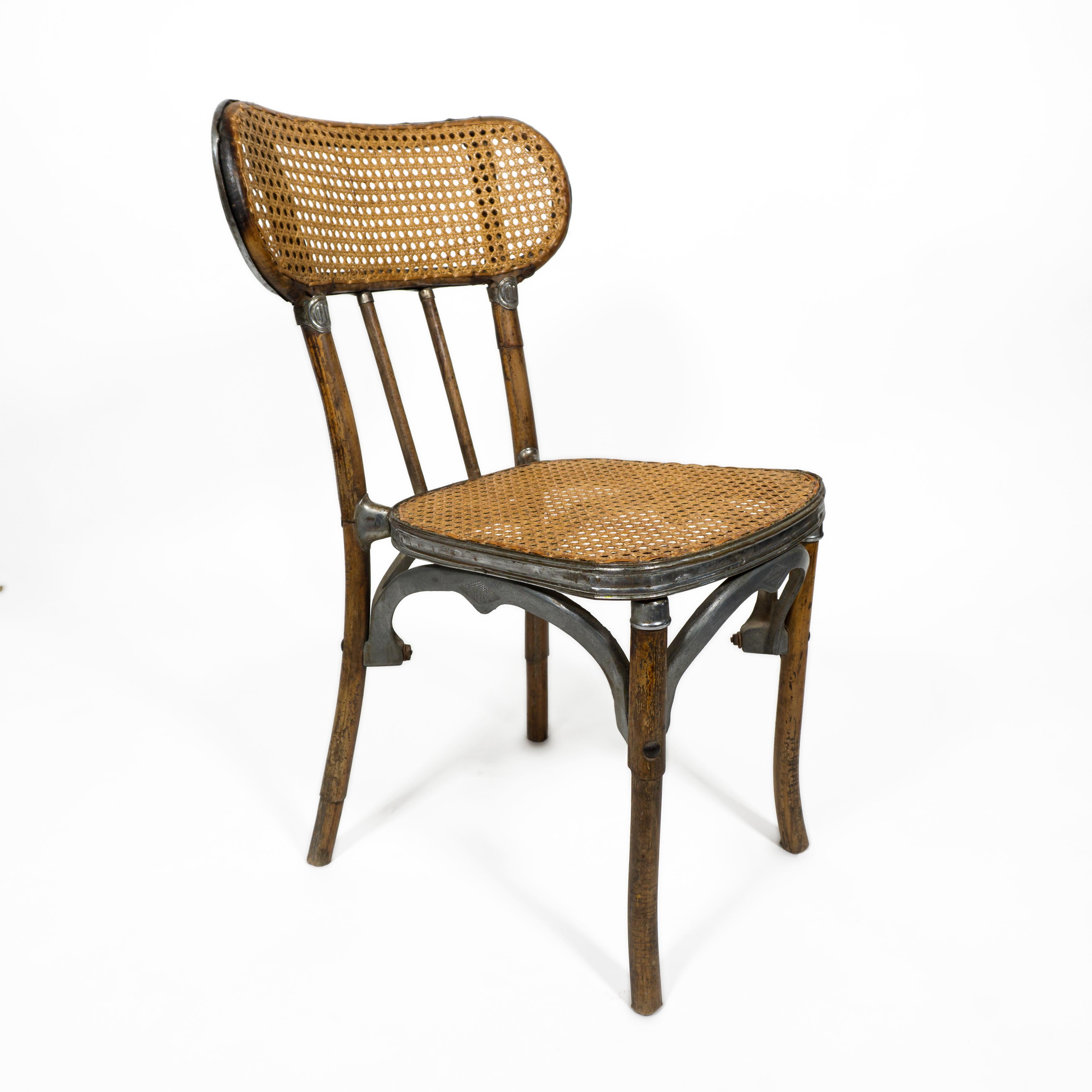 Beautiful french 'La Glaneuse' vintage Bamboo and cane dinning chair from the 1940s. 
This gorgeous antique chair is made of bamboo and has many attractive aluminium details (marked: La Glaneuse. Cadenet. Vaucluse. Provence / Alpes / Côte d'Azur /