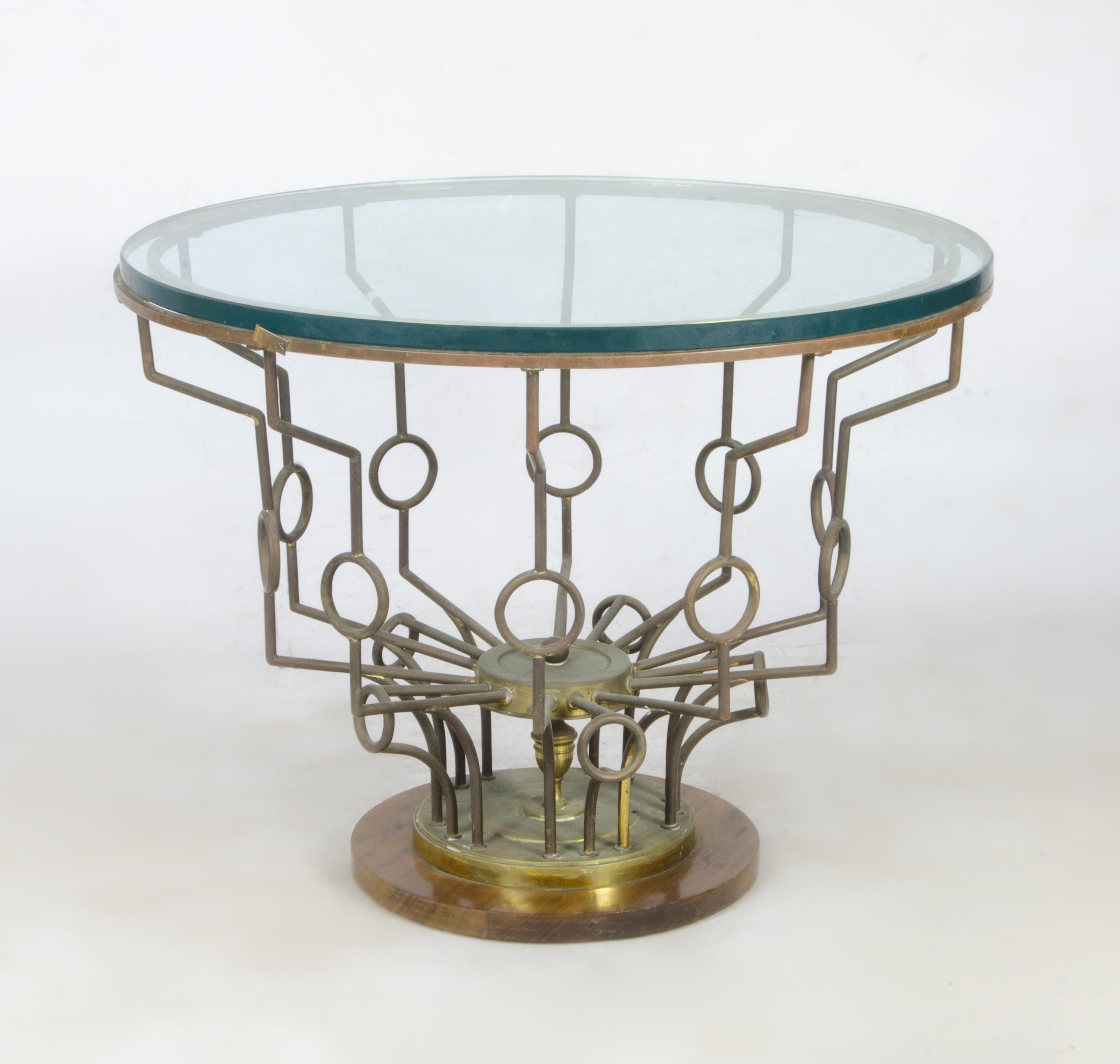 1940s Mid-Century Modern circular glass side table with bronze structure, France

By: unknown
Material: copper, zinc, metal, bronze, glass, crystal
Technique: cast, molded, polished, gilt, metalwork
Dimensions: 27.5 in x 21.5 in
Date: mid-20th