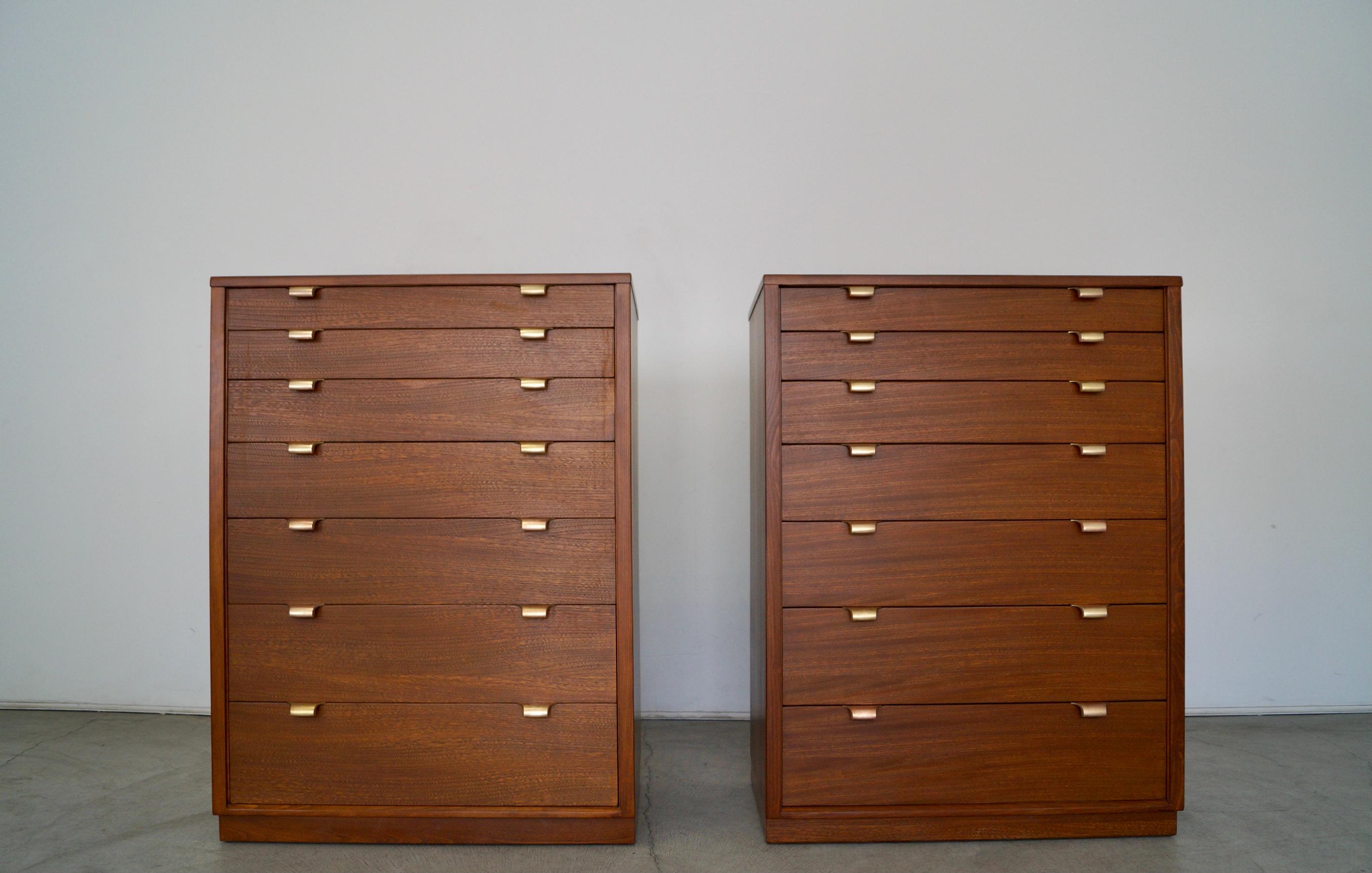 Vintage Mid-Century Modern pair of dressers for sale. These were manufactured in the 1947, and designed by Edward Wormley for Drexel. They're part of the Precedent series. They have been professionally refinished in walnut, and are beautifully