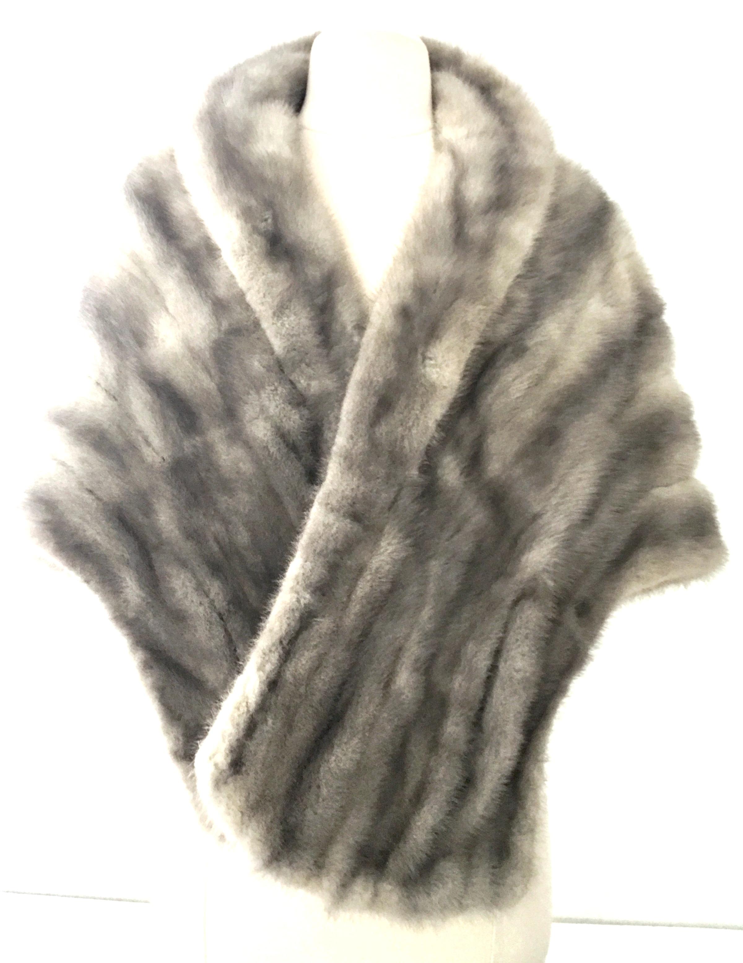 1940'S Mink Fur Silver Blue Capelet By,  Tronvold Furs-Sioux City. This lovely silver-blue mink capelet features two exterior side pockets, pristine lining in silver satin and the original owners monograms located in the interior, ALW. Original