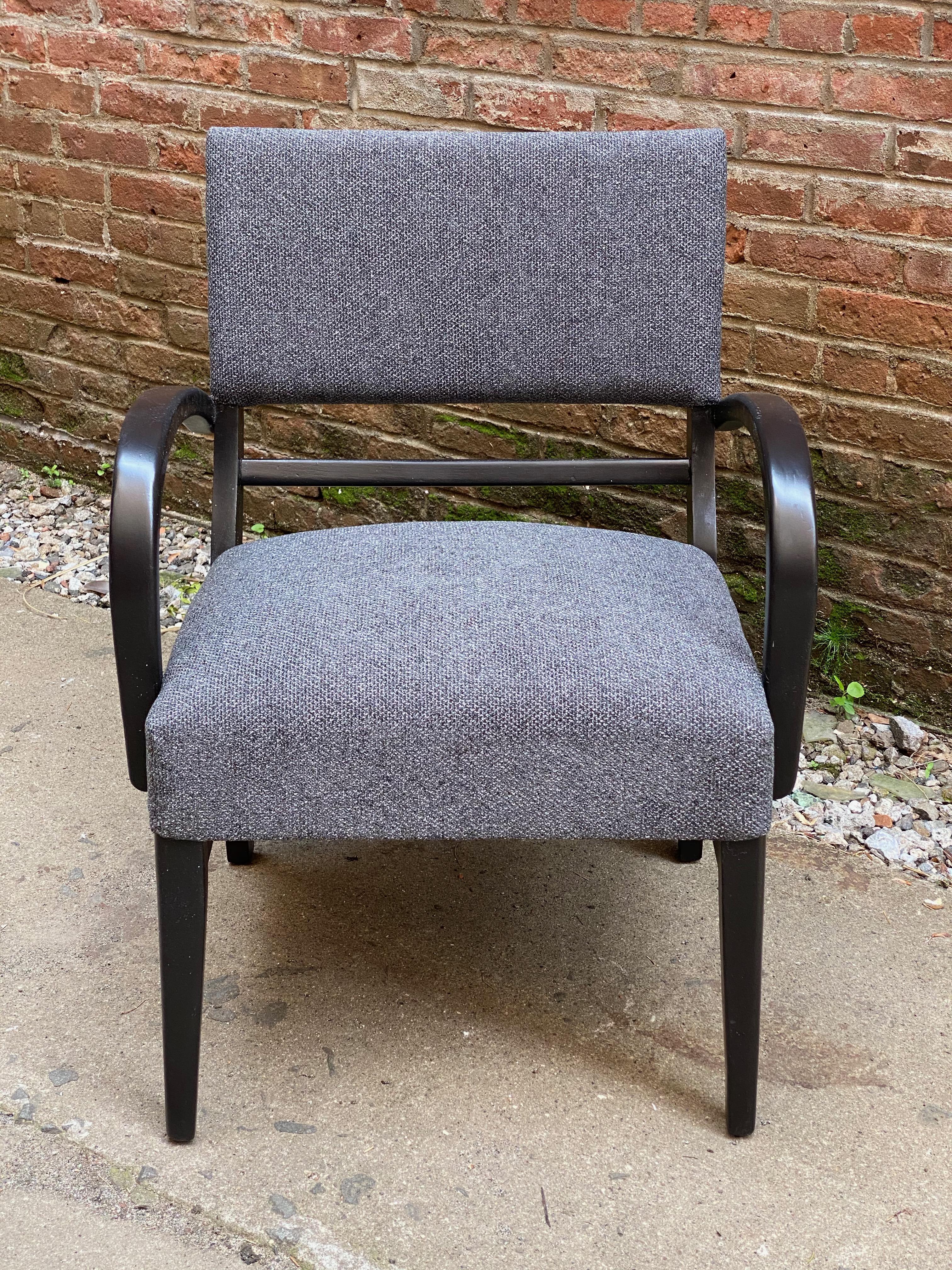 Late 1940s bow arm lounge chair. Reupholstered in a nicely textured gray fabric. Custom black painted wood frame. Great lines and profile. Stretcher base and tapered front legs. Structurally sound and sturdy.

Measures: Approximately 24