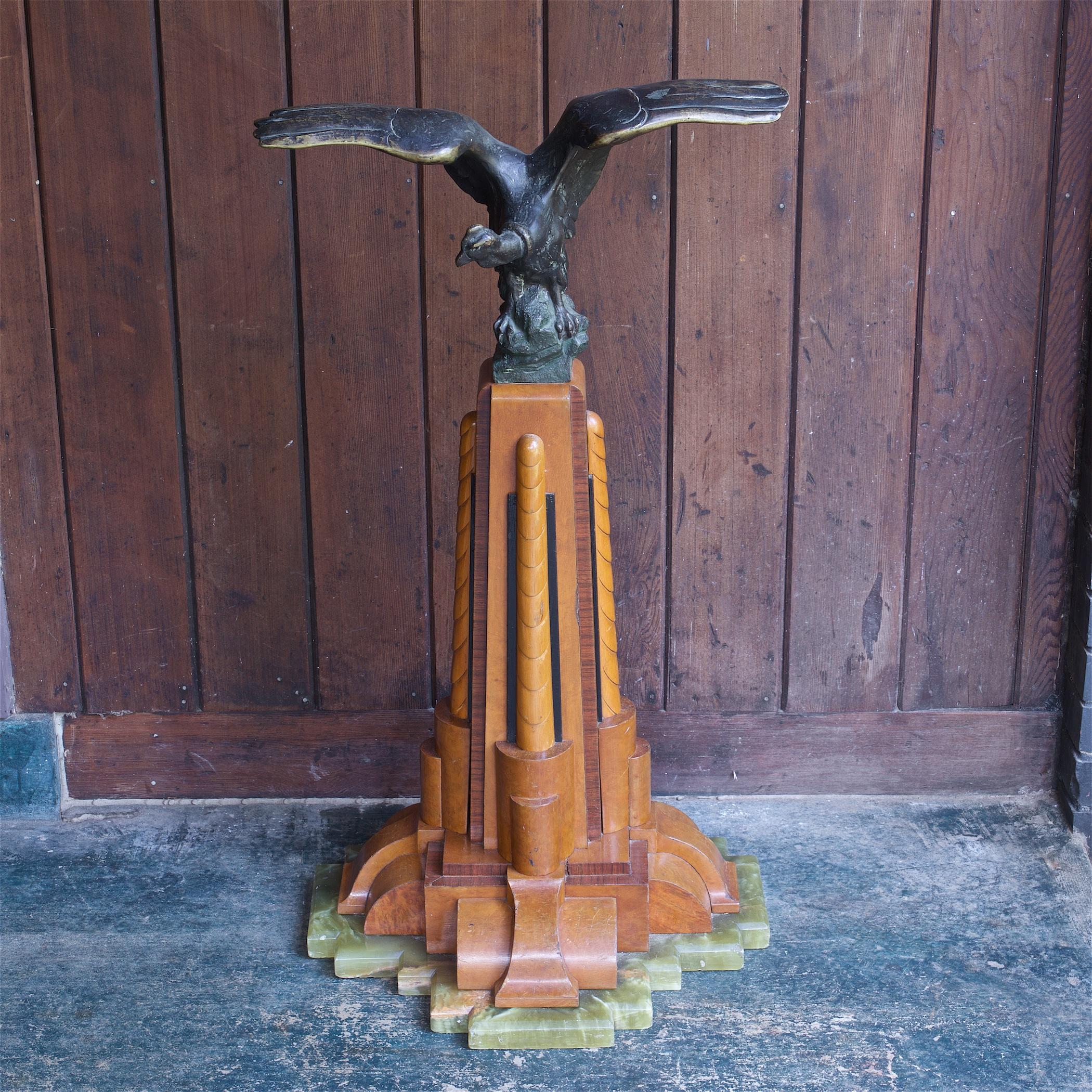 Previous owner mentioned that this was a maquette for a building design to be built or was built in Chicago. I found no references to a condor building or information about this condor sculpture. Artist remains unknown to us, it is numbered and