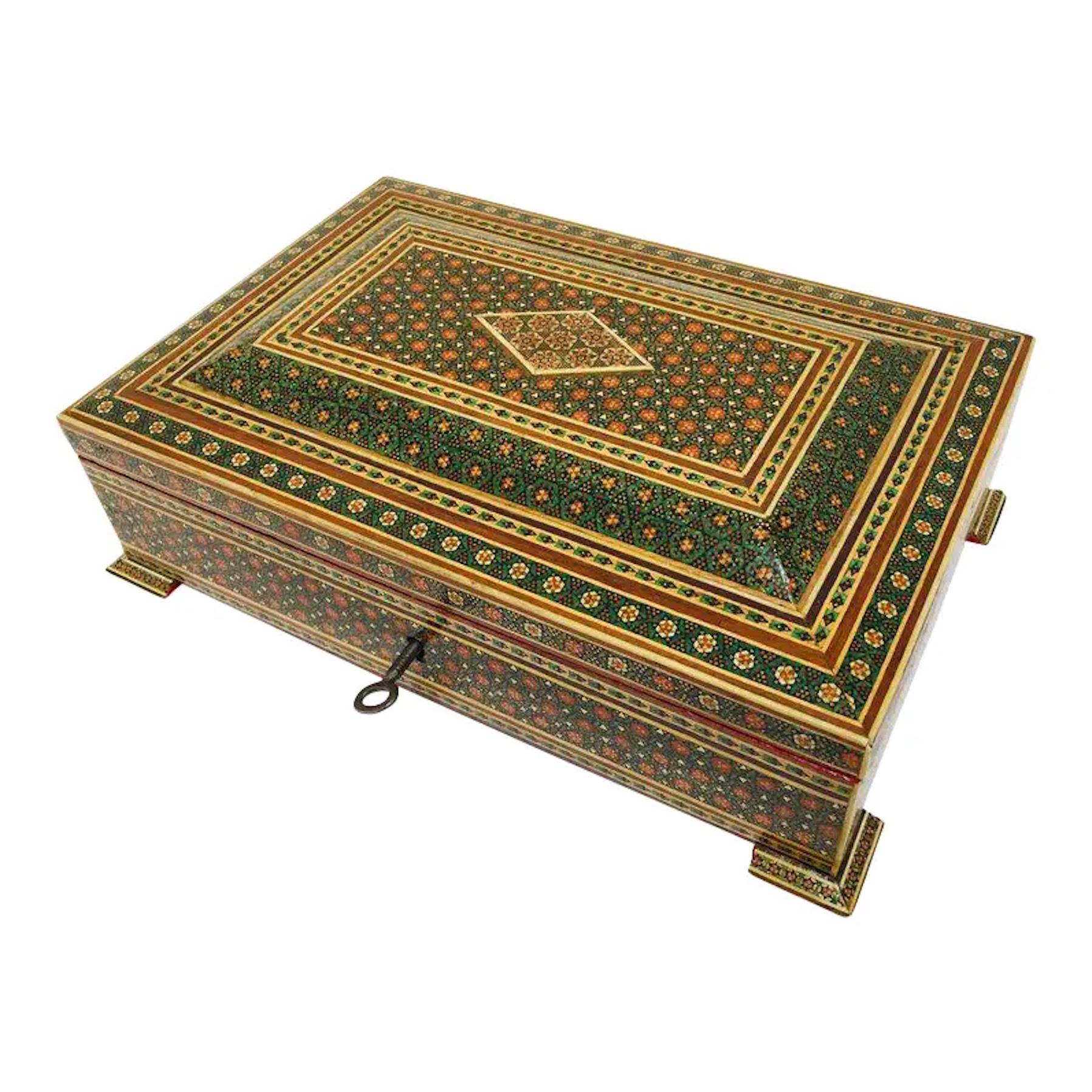 1940s Moorish Anglo-Indian Persian jewelry Mosaic Khatam inlaid box.
Large Anglo-Persian micro mosaic marquetry inlaid box with floral and geometric design. 
Handcrafted Khatam wooden box with very delicate micro mosaic marquetry from the ancient
