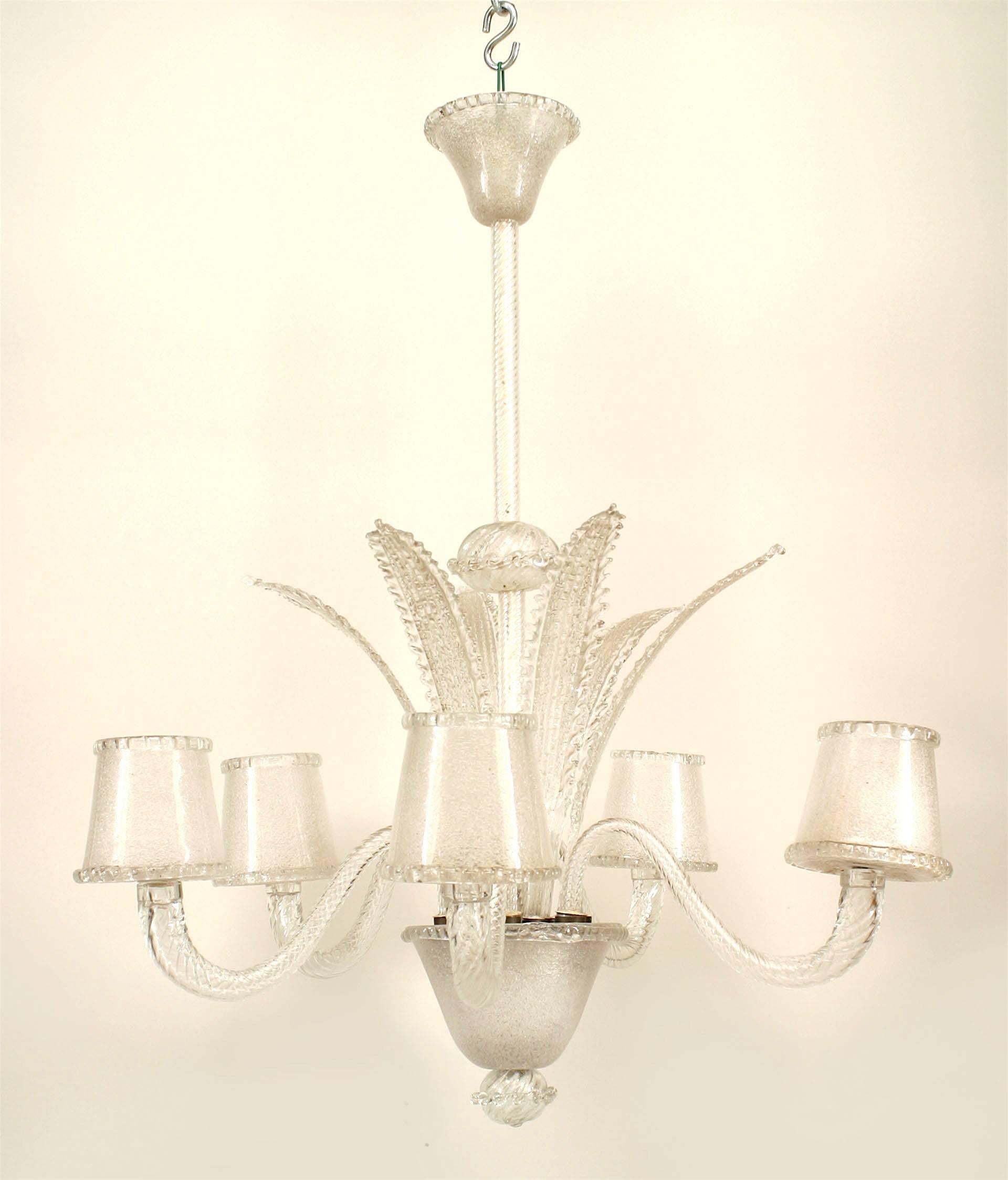 Italian (1940s) Murano clear glass chandelier with 5 scroll and swirl glass design arms supporting light shades with 5 centered feathers and a finial bottom.
