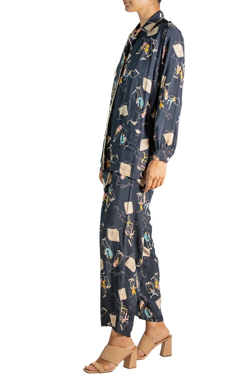 Freshly clean and laundered these vintage lounge pjs are ready to wear. They show signs of wear and a few repairs but the print is super fun and cool on this rare vintage item. 1940S Navy Blue Cold Rayon Marionettes On The Tv Pajamas 