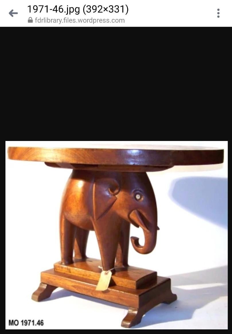 Wood 1940s Nigerian Carved Mahogany End Tables With Elephant Bases - a Pair. For Sale