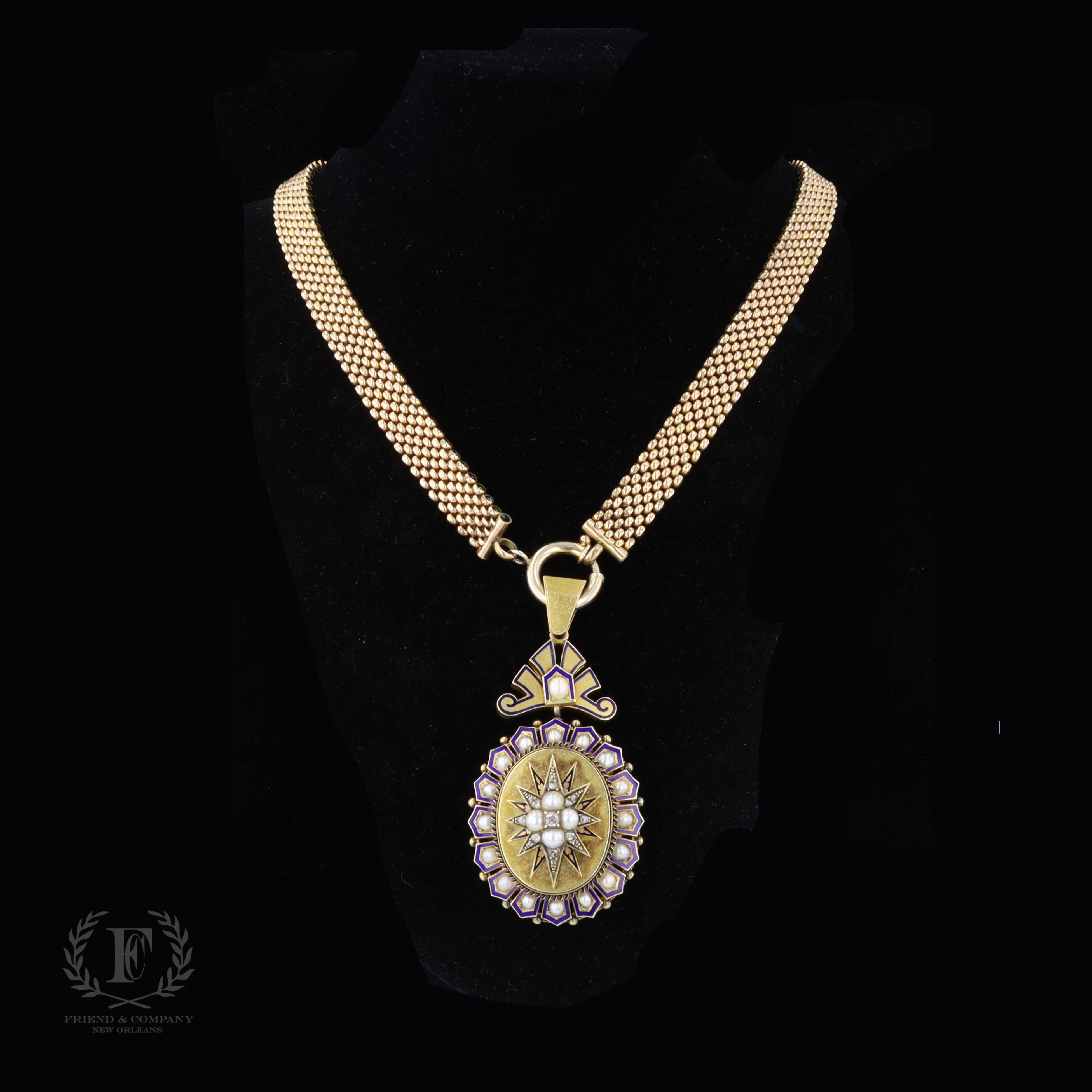 This charming 14 karat yellow gold enamel pendant necklace dates back to the 1940s. A photo can be added to the back of the pendant. The pendant is set with pearl and diamond accents. The measurements of the pendant are 71 millimeters by 35
