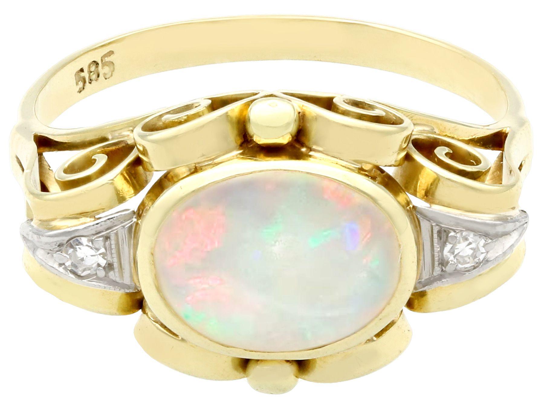Oval Cut 1940s Cabochon Cut Opal and Diamond Yellow Gold Cocktail Ring For Sale