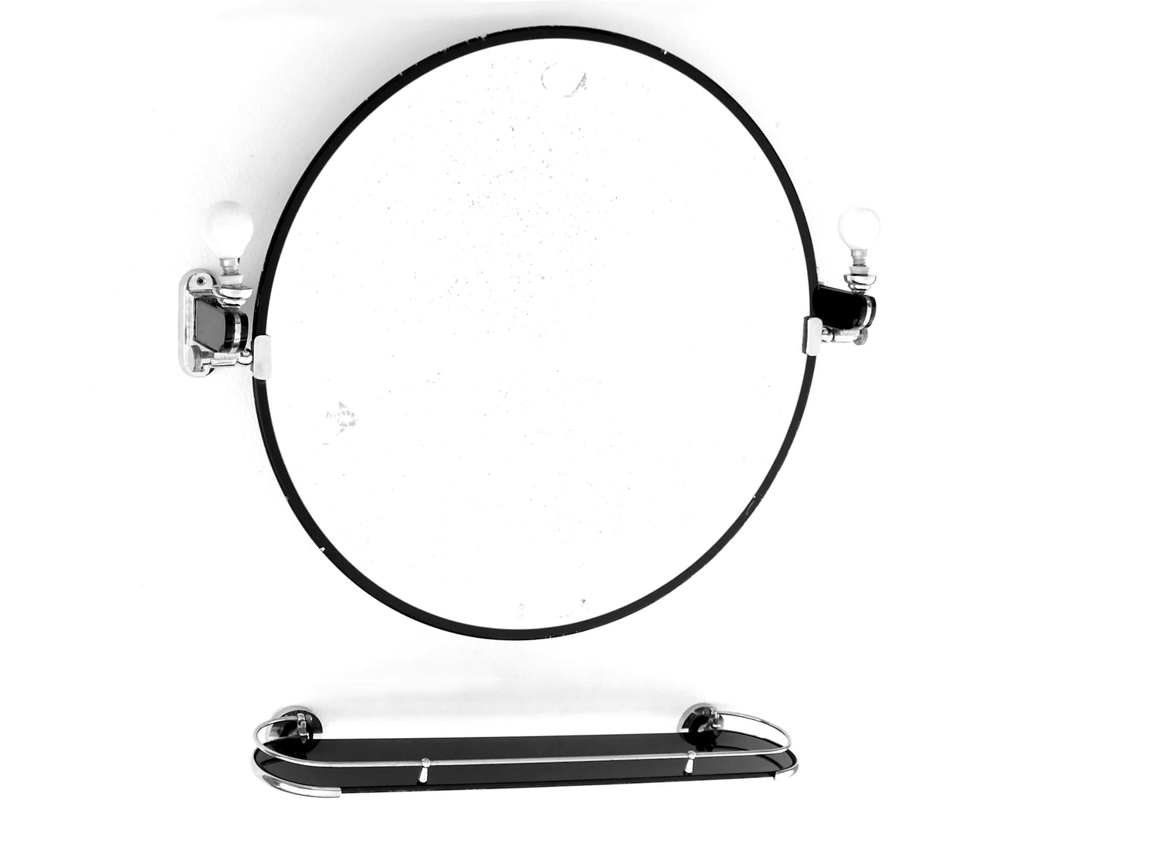 Osvaldo Borsani design 30 Metalvetro Galvorame Siena tilting wall mirror set

 Perfect vintage condition with light stains in the mirror

 Missing the two little lampshade in glass

 Material; metal chrome, black glass and mirror glass

