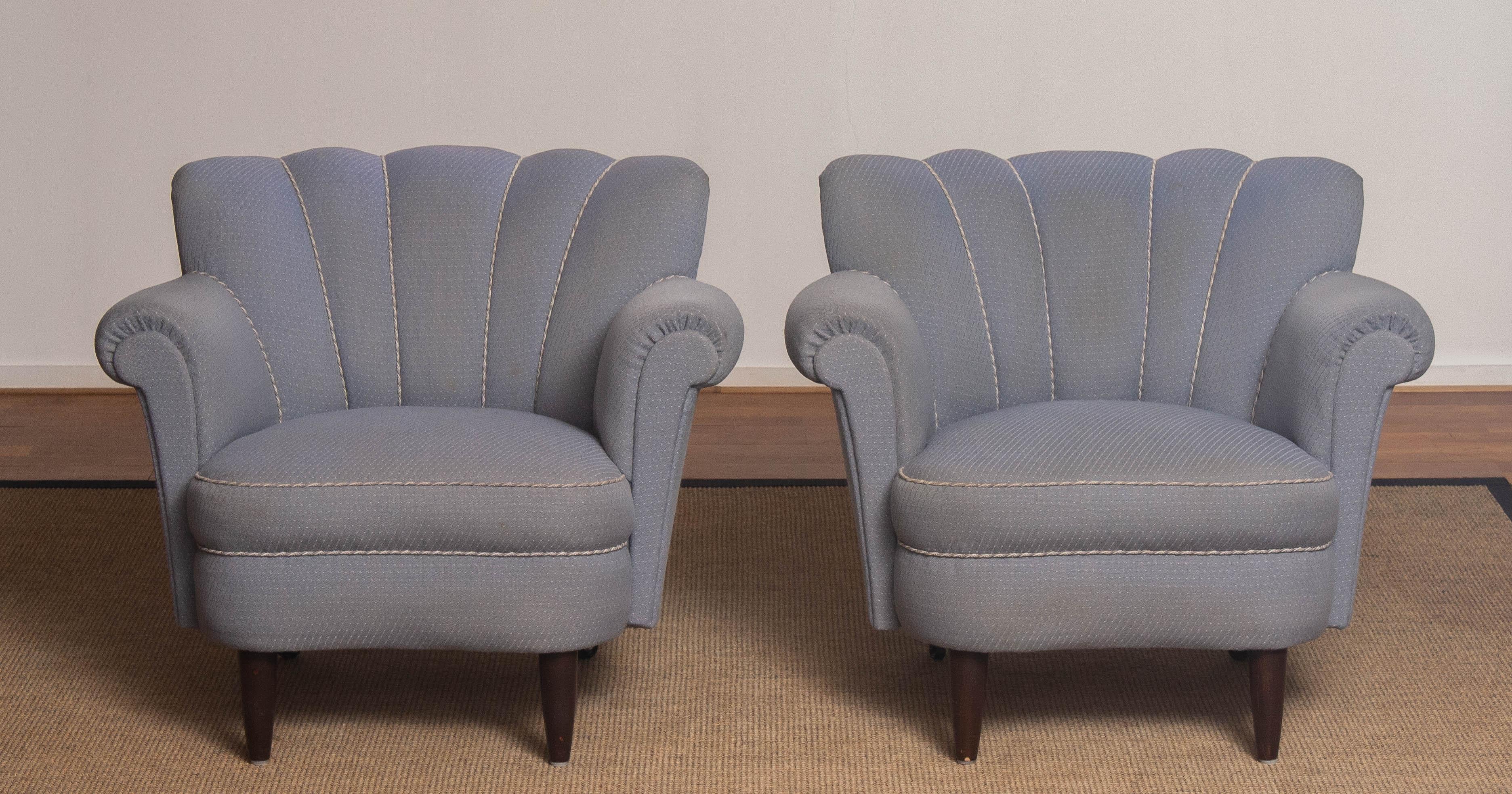 Beautiful designed shell-back chairs attributed to Carl-Johan Boman for Boman Oy Finland.
Overall the chairs are in good condition and sit and support very good. The wool upholstery shows stains and therefor we advice re-upholstery.
 