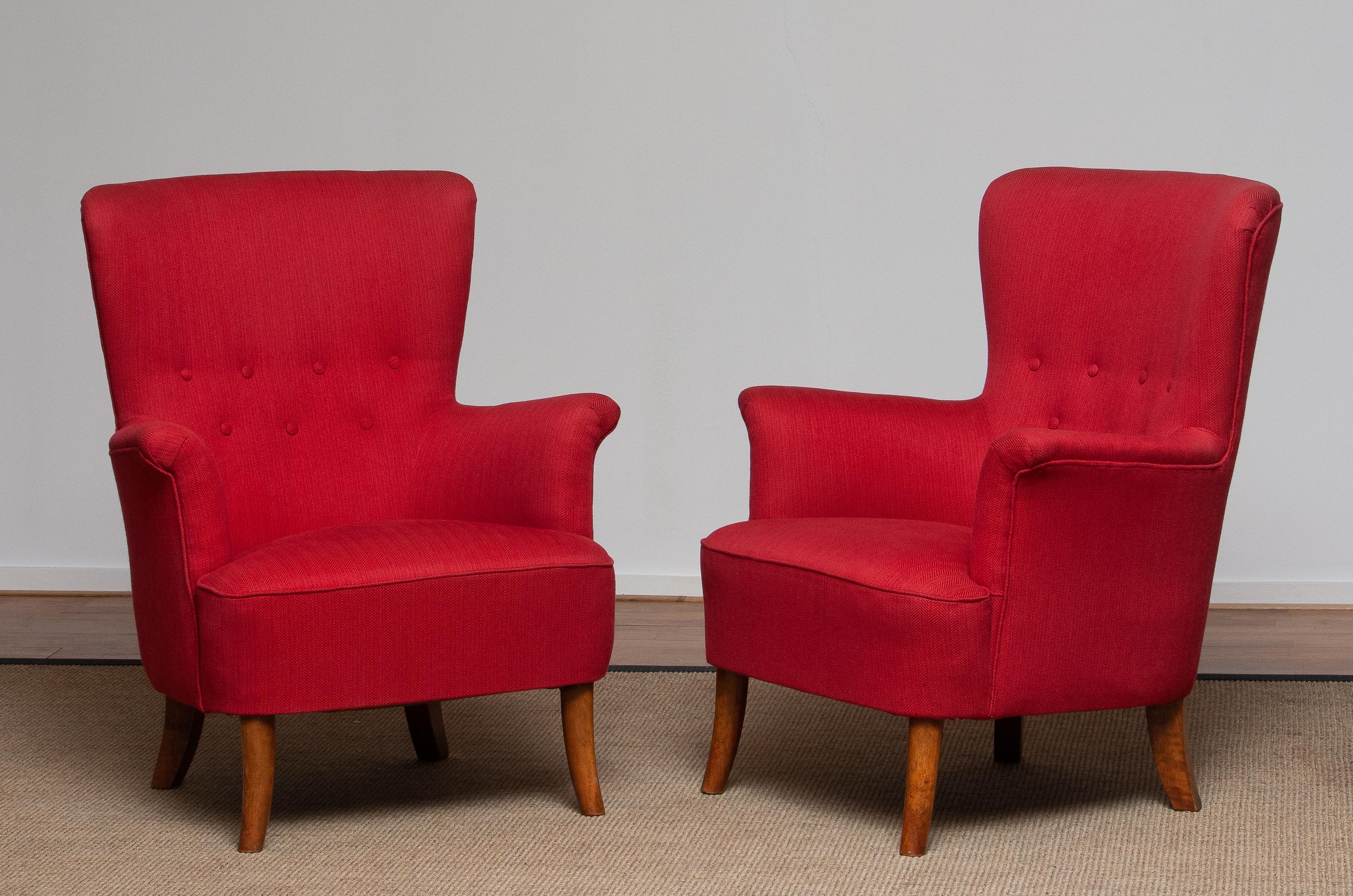 Beautiful set of two fuchsia / red easy / lounge chairs designed by Carl Malmsten for OH Sjogren, Sweden.
The overall condition is good and clean.
Period: 1940-1949.
Note that one chair has a tiny hole in the back which we will repair but it will