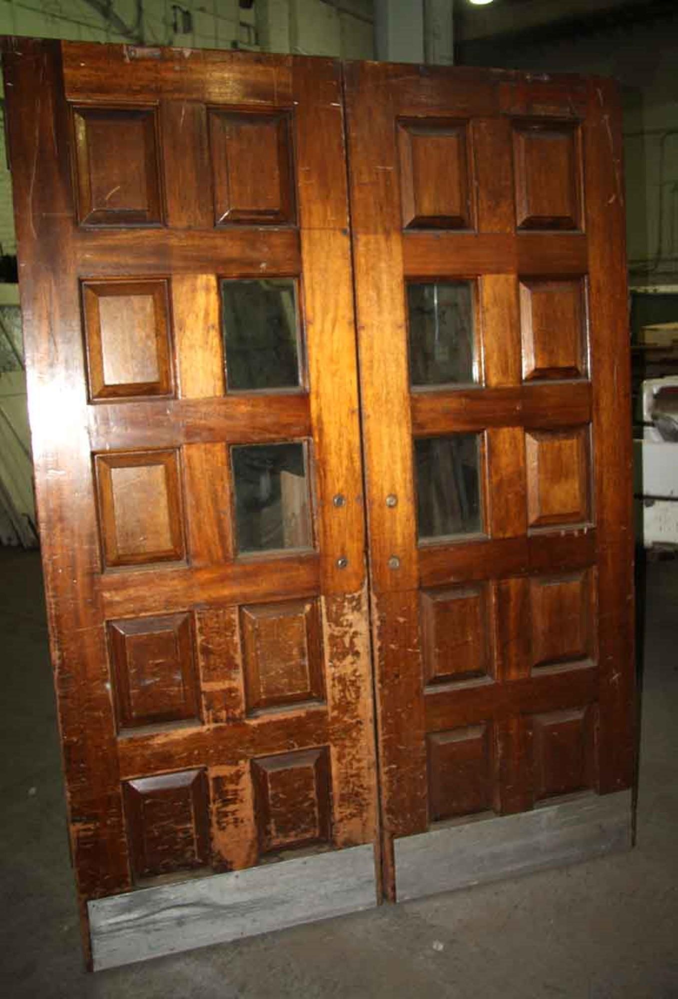 Mid-20th Century 1940s Pair of Antique 8-Panel 2 Lite Carved Wood Tall Swinging Doors