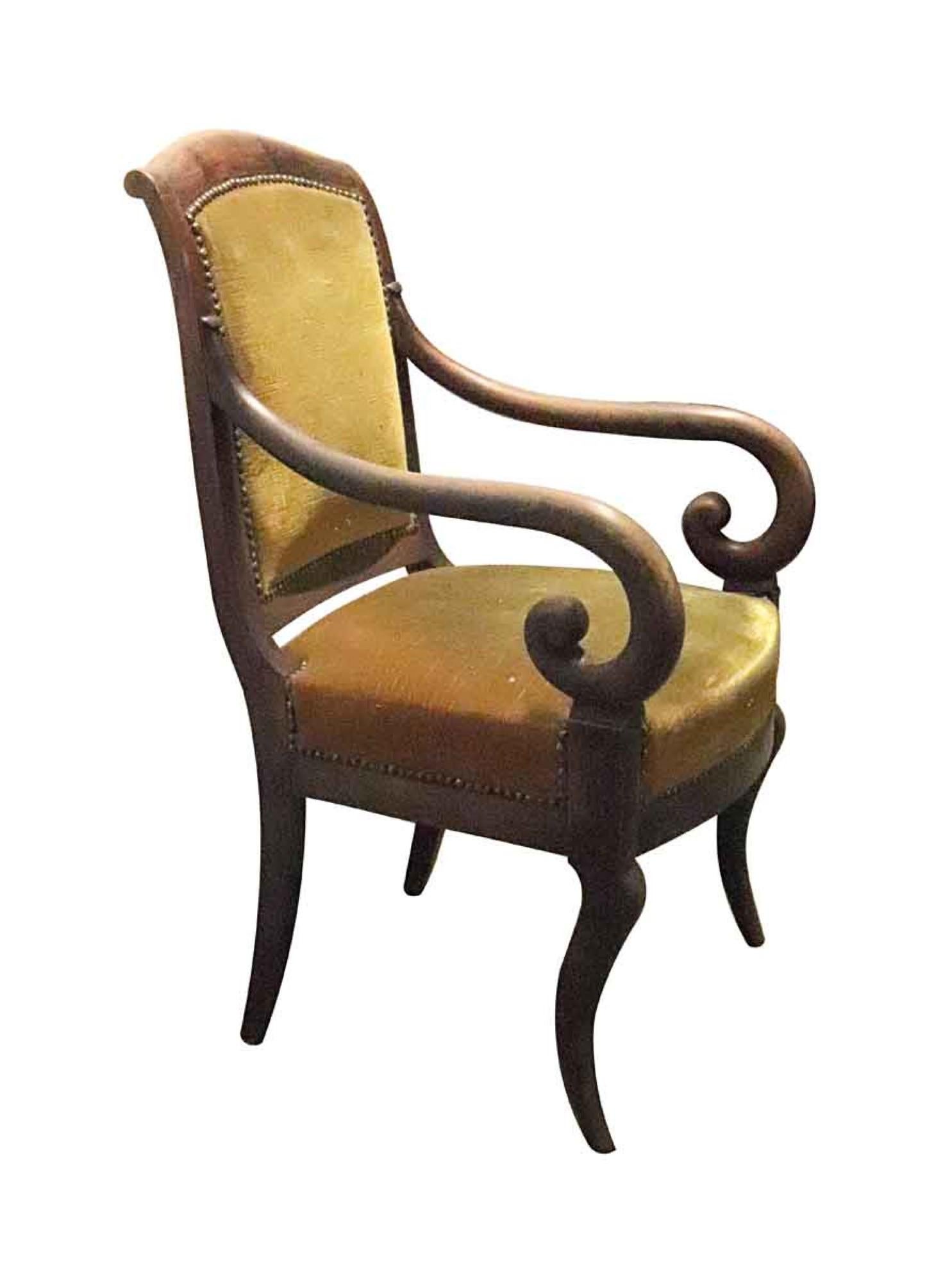 1940s pair of French Empire style armchairs with worn dark yellow upholstery. The frames are strong and in good condition, finish is showing wear also. Priced as a pair. This can be seen at our 333 West 52nd St location in the Theater District West