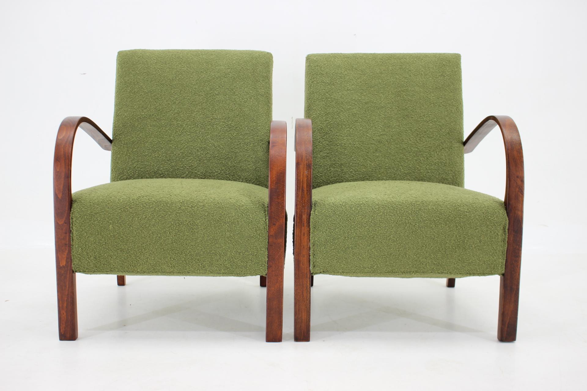 - Carefully refurbished 
- Newly upholstered in green boucle fabric