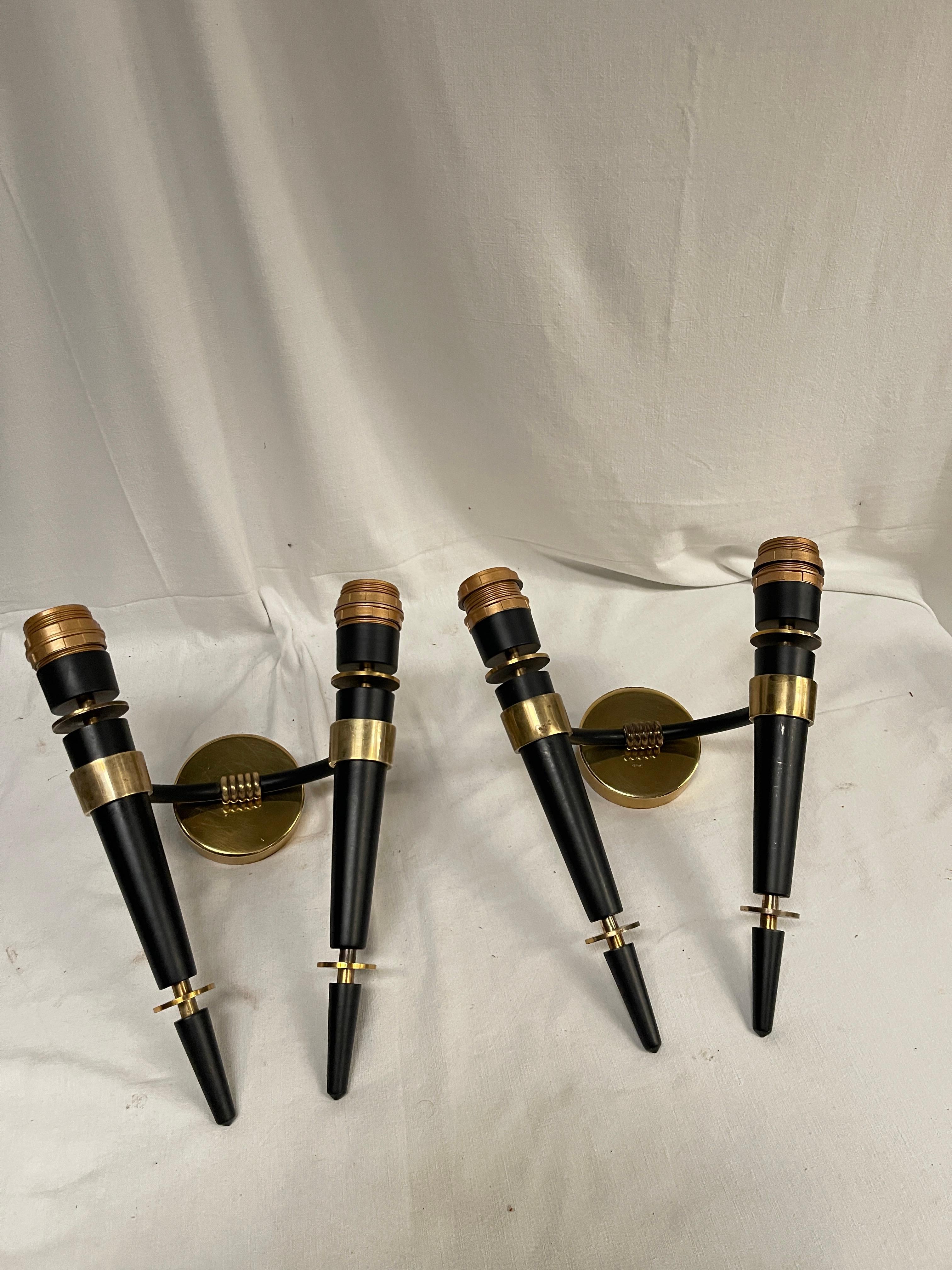 1940's sconces in the style of Jacques Adnet
France
Shade not included