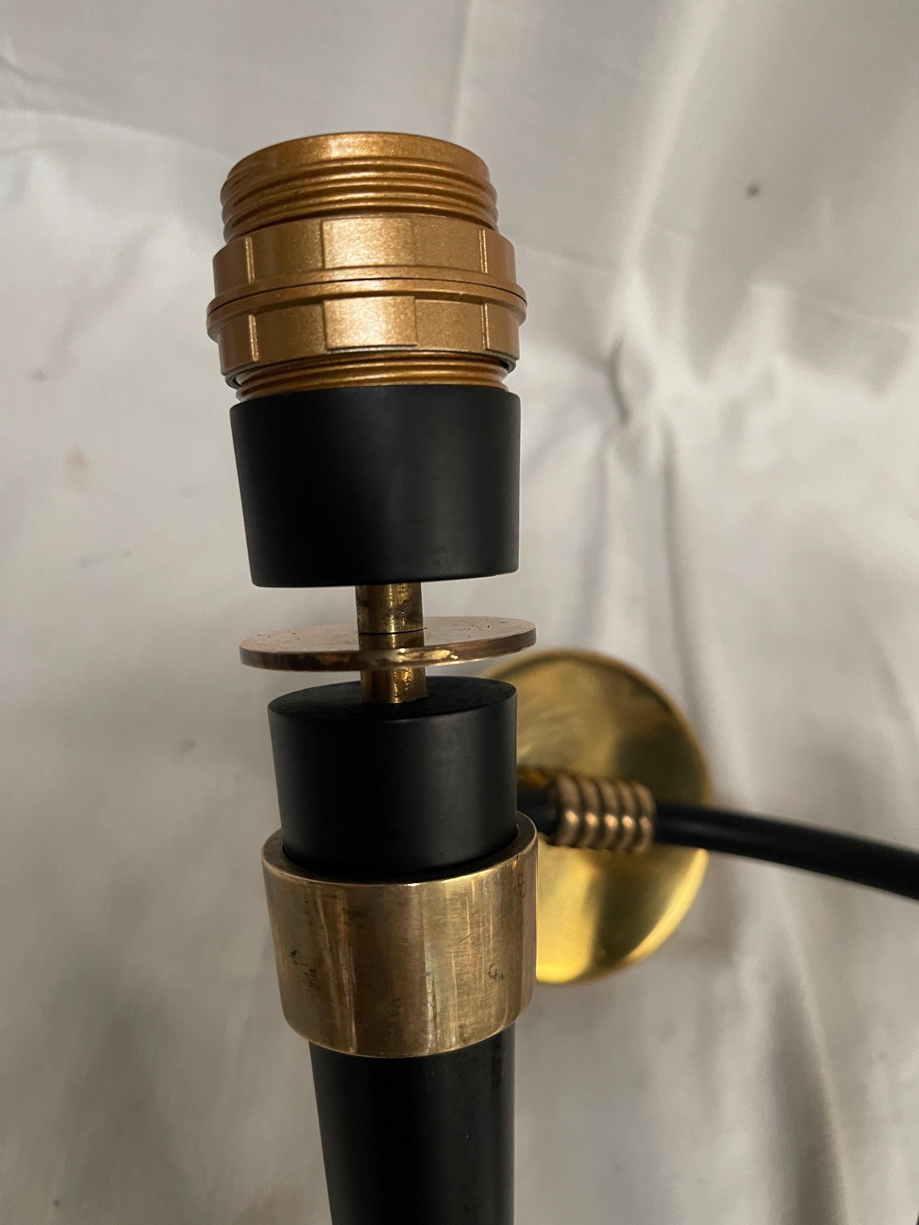 Mid-20th Century 1940's pair of sconces in the style of Jacques Adnet For Sale