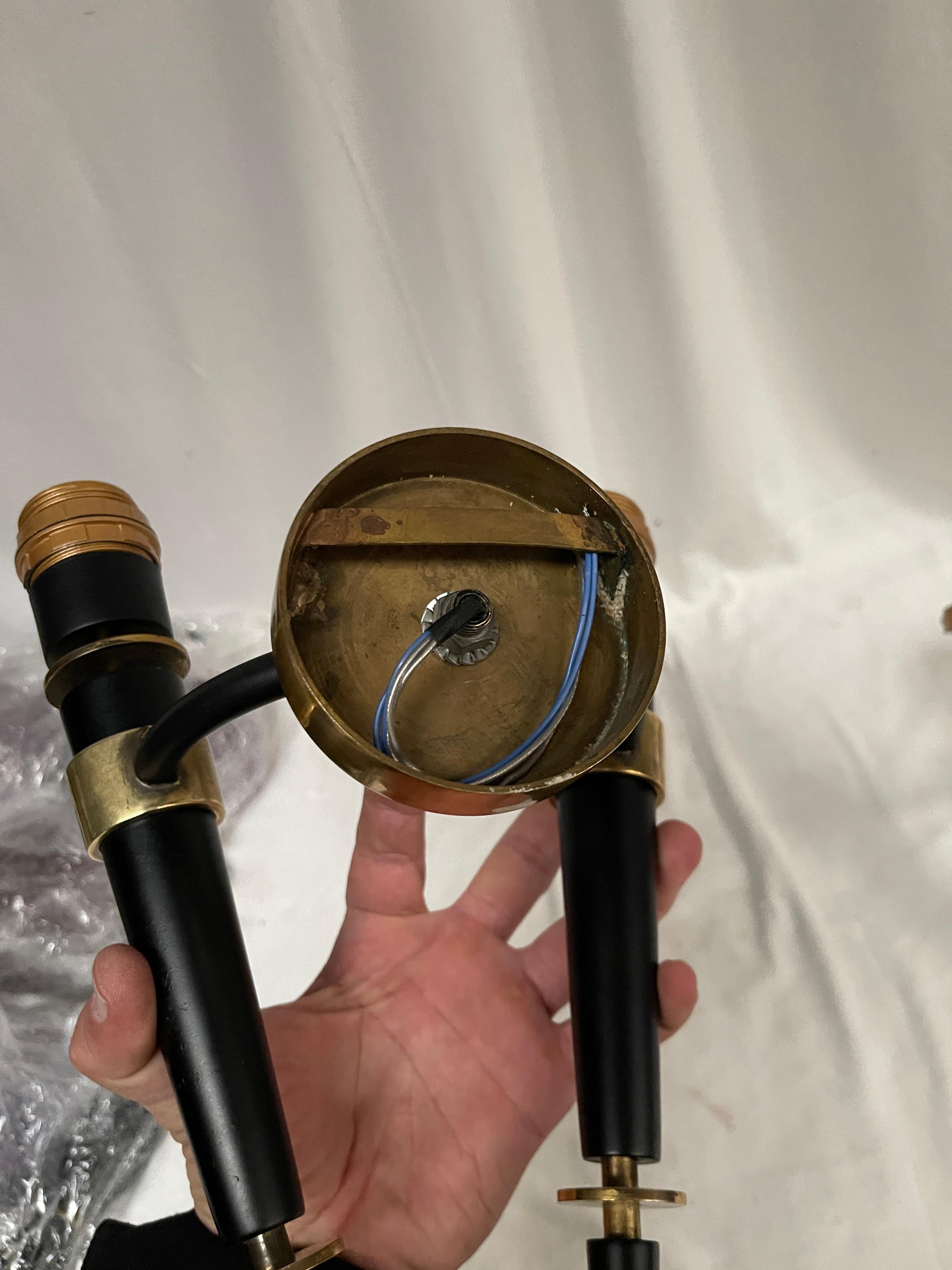 Metal 1940's pair of sconces in the style of Jacques Adnet For Sale