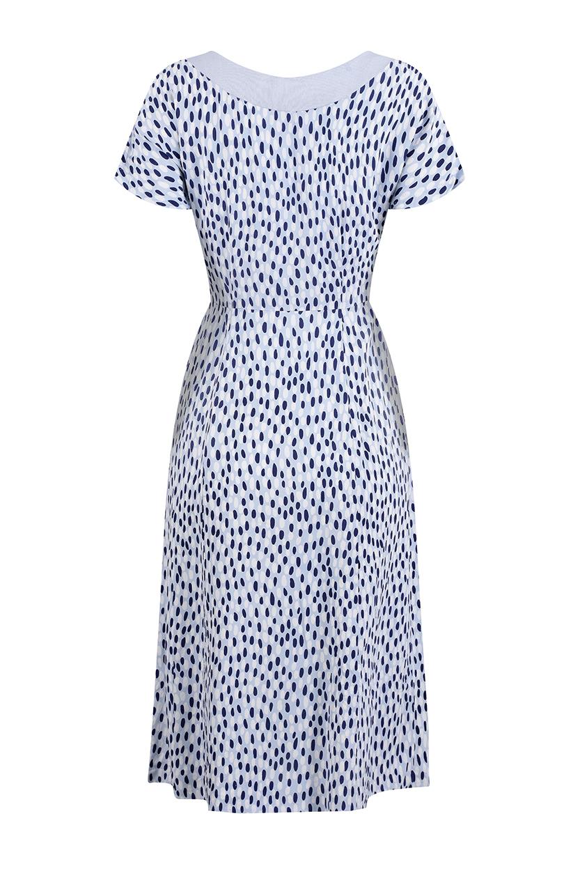 This charming 1940s cold rayon pebble print dress in pale blue, navy and white is captivating in its simplicity and is in beautiful vintage condition. A tidy shift cut, this dress features a gentle scoop neckline trimmed in pale blue linen with
