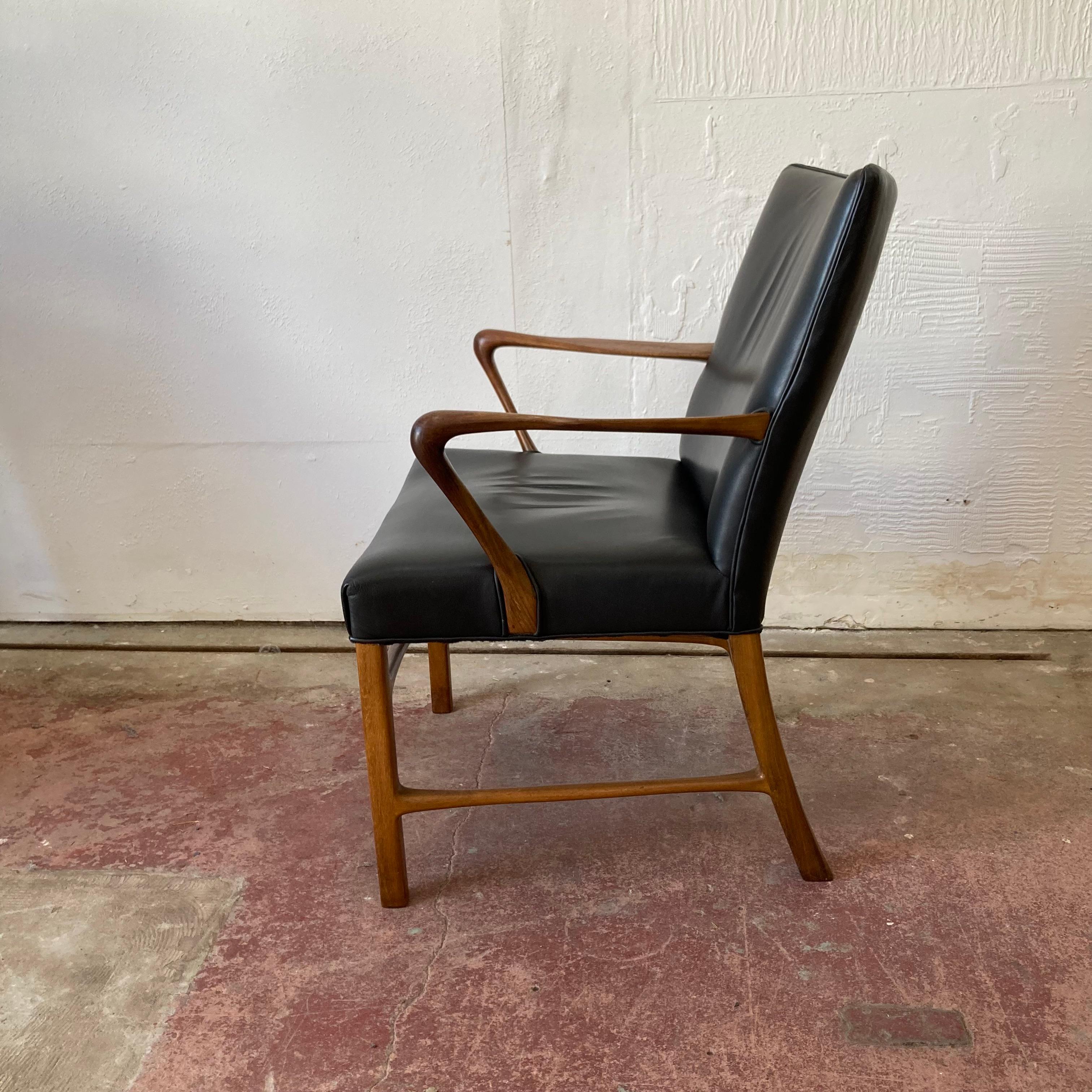 Leather 1940's Palle Suenson armchair, Danish designer For Sale