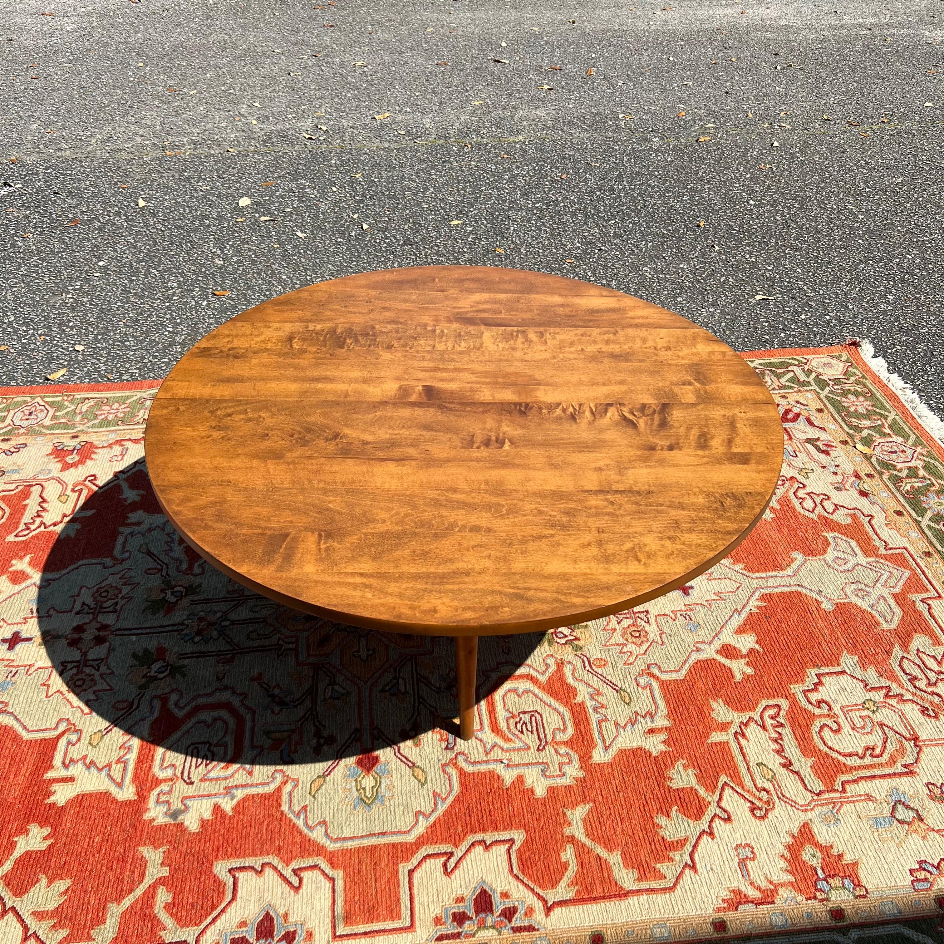 Newly refinished Early solid maple 36” round coffee table. Designed by Paul McCobb for his Planner Group Collection, 1948.
Rare leg configuration.Restored condition.
36” Round, 15.25” tall

This piece is not marked but it is well documented.   And