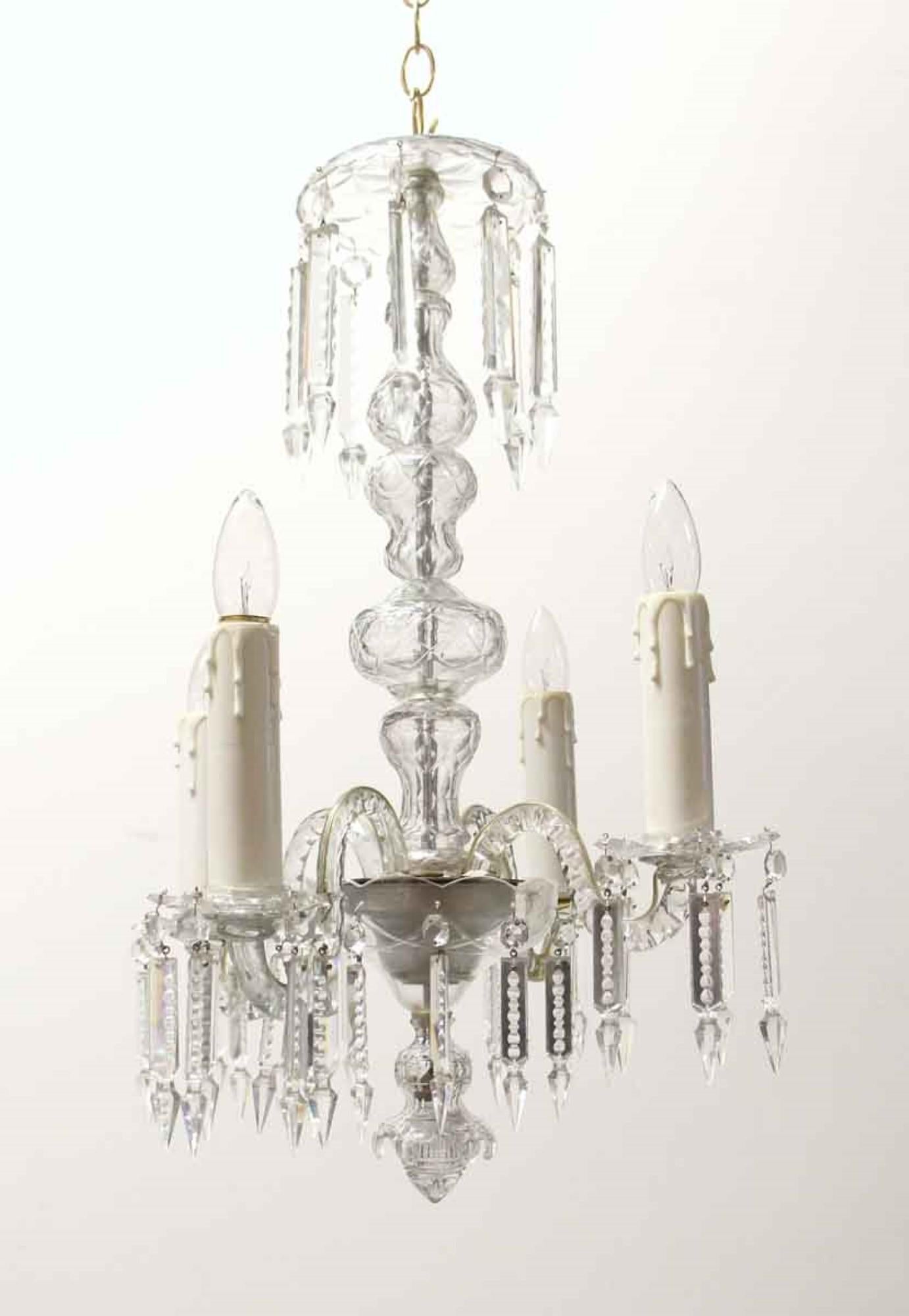 Baccarat Bohemian style four-arm clear crystal chandelier from the 1940s. One minor repair to one arm, please see photos. This can be seen at our 400 Gilligan St location in Scranton. PA.