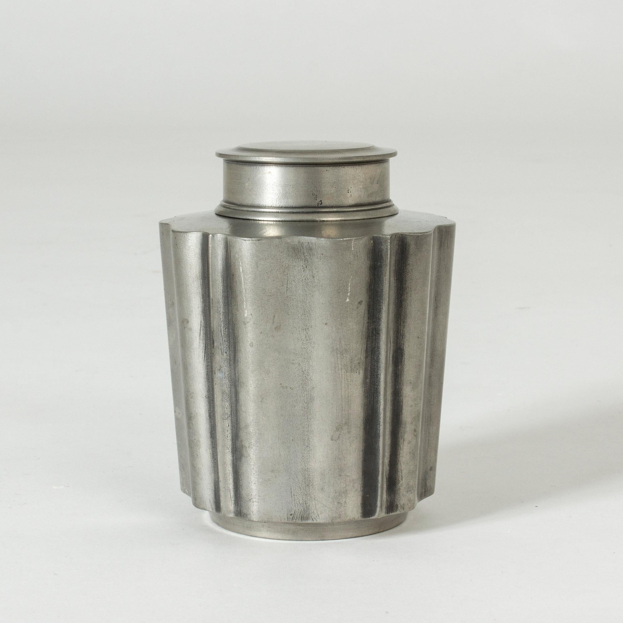 Elegant, cool pewter jar with lid by Edvin Ollers.