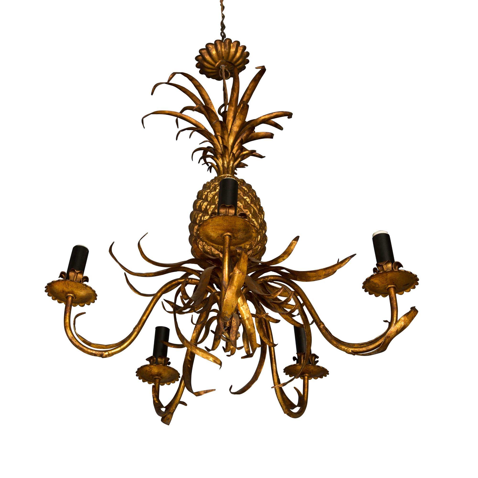 This 1940s five-arm chandelier is created in the shape of a pineapple and is a beautiful gold color. The arms are formed as elegant leaves, each holding a light upon a platter. The drop height of this chandelier can be adjusted by adding a chain.